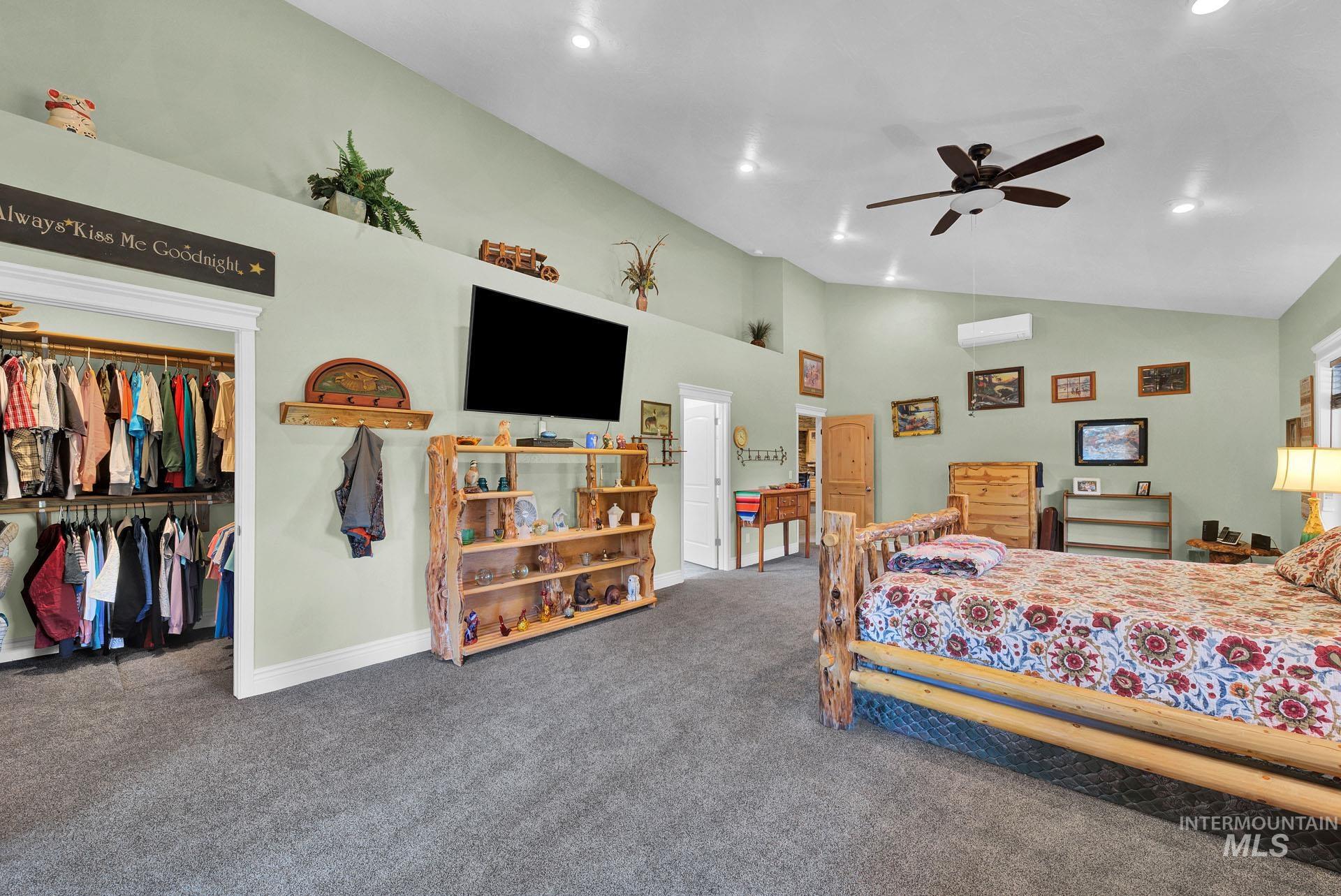Primary Suite with walk in closet - plant shelf and gorgeous Primary Bath area