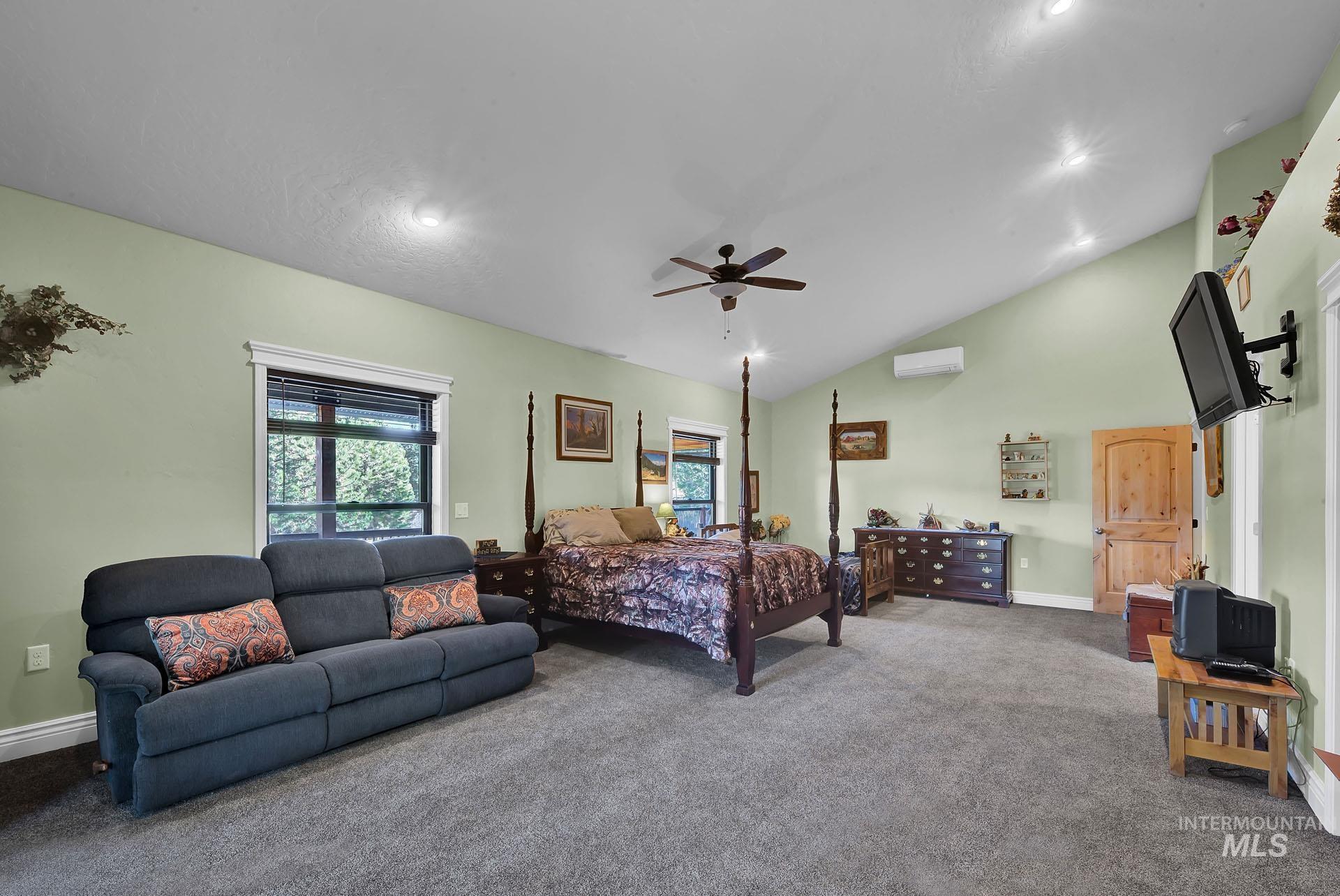 Spacious Secondary Bedroom Suite with plenty of natural light - vaulted ceiling and bath attached