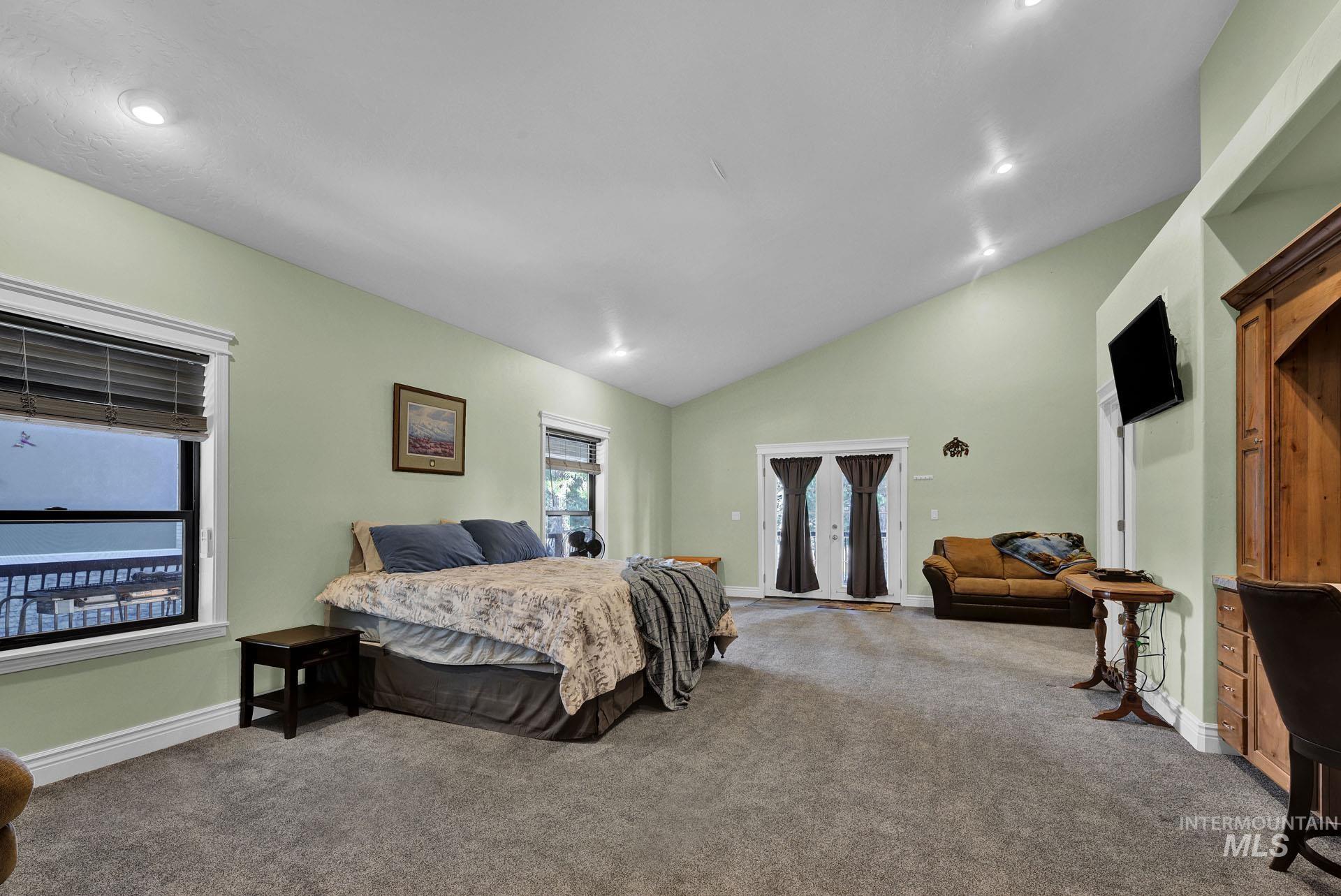 Bedroom Suite features a make up dresser, attached bath area, walk in shower and side mini kitchen area.