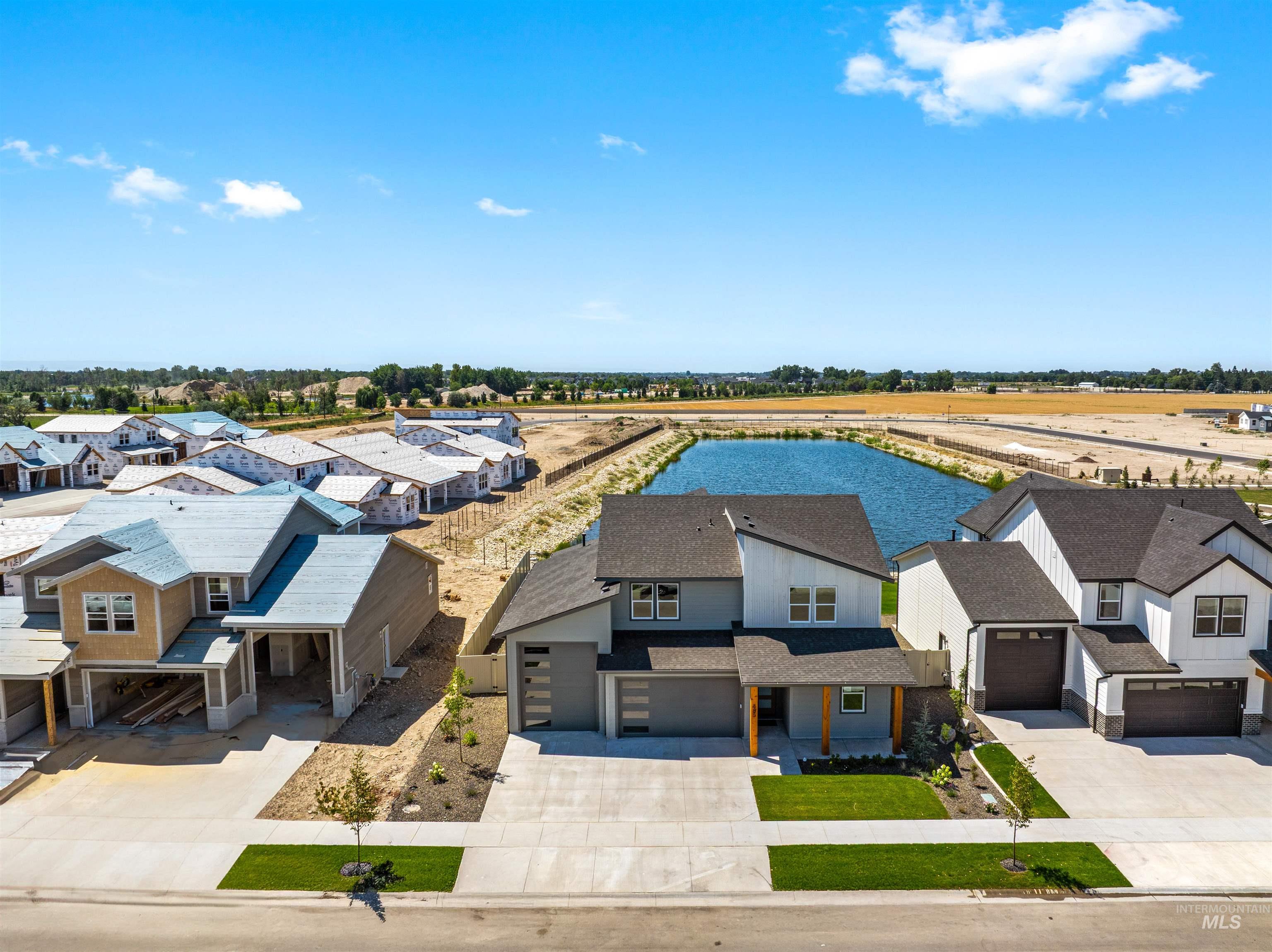 Aerial view of residential area with a nearby body of water