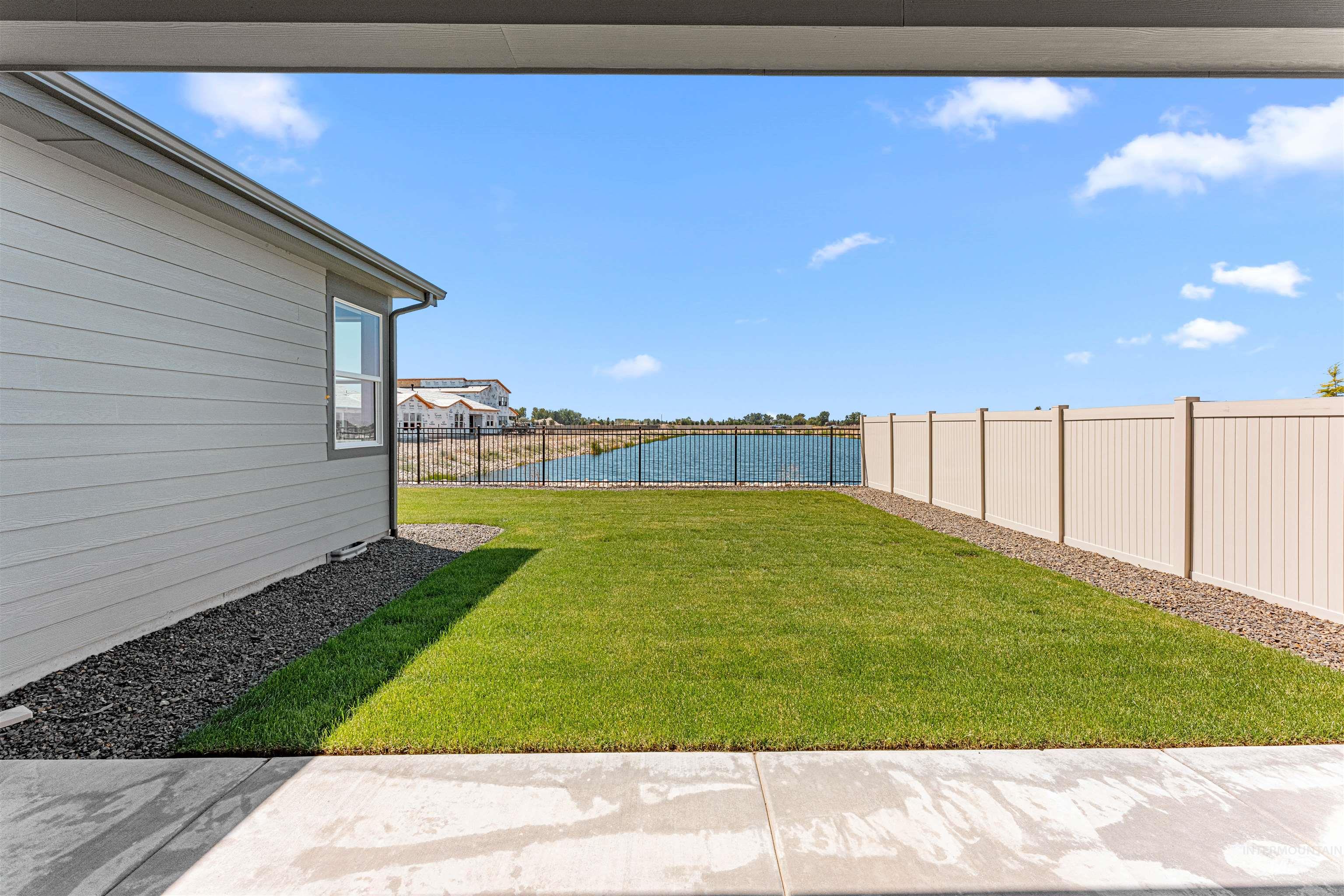 View of fenced backyard
