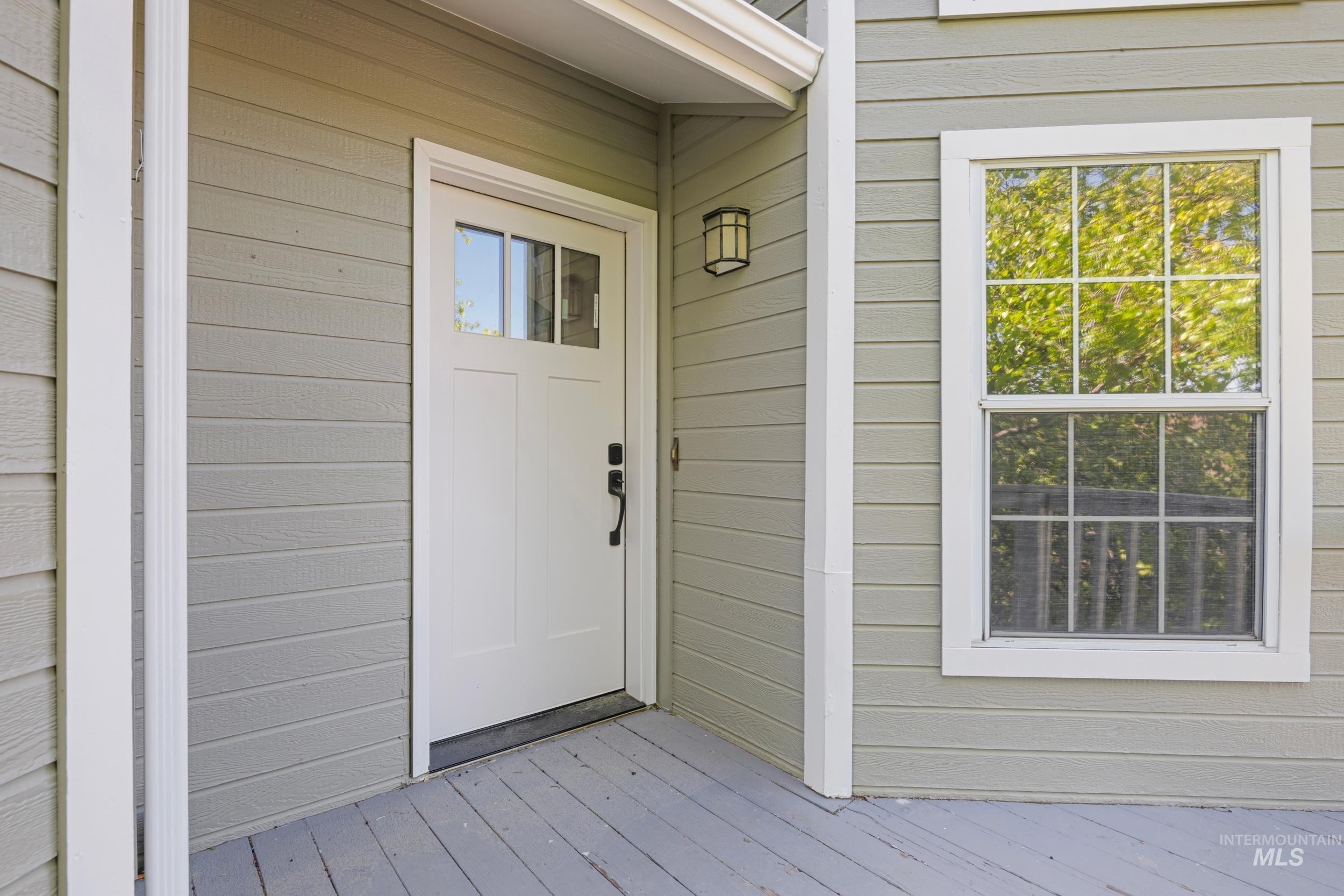 Entrance to property with a deck