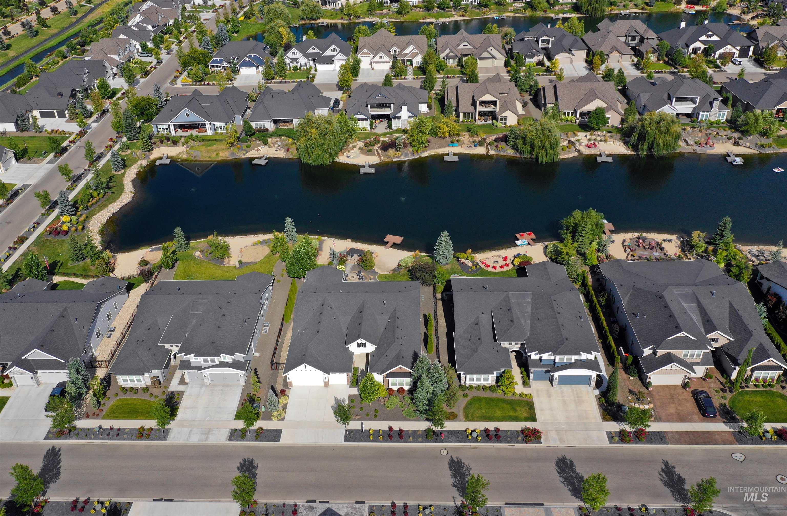 View of property location with nearby suburban area and a large body of water