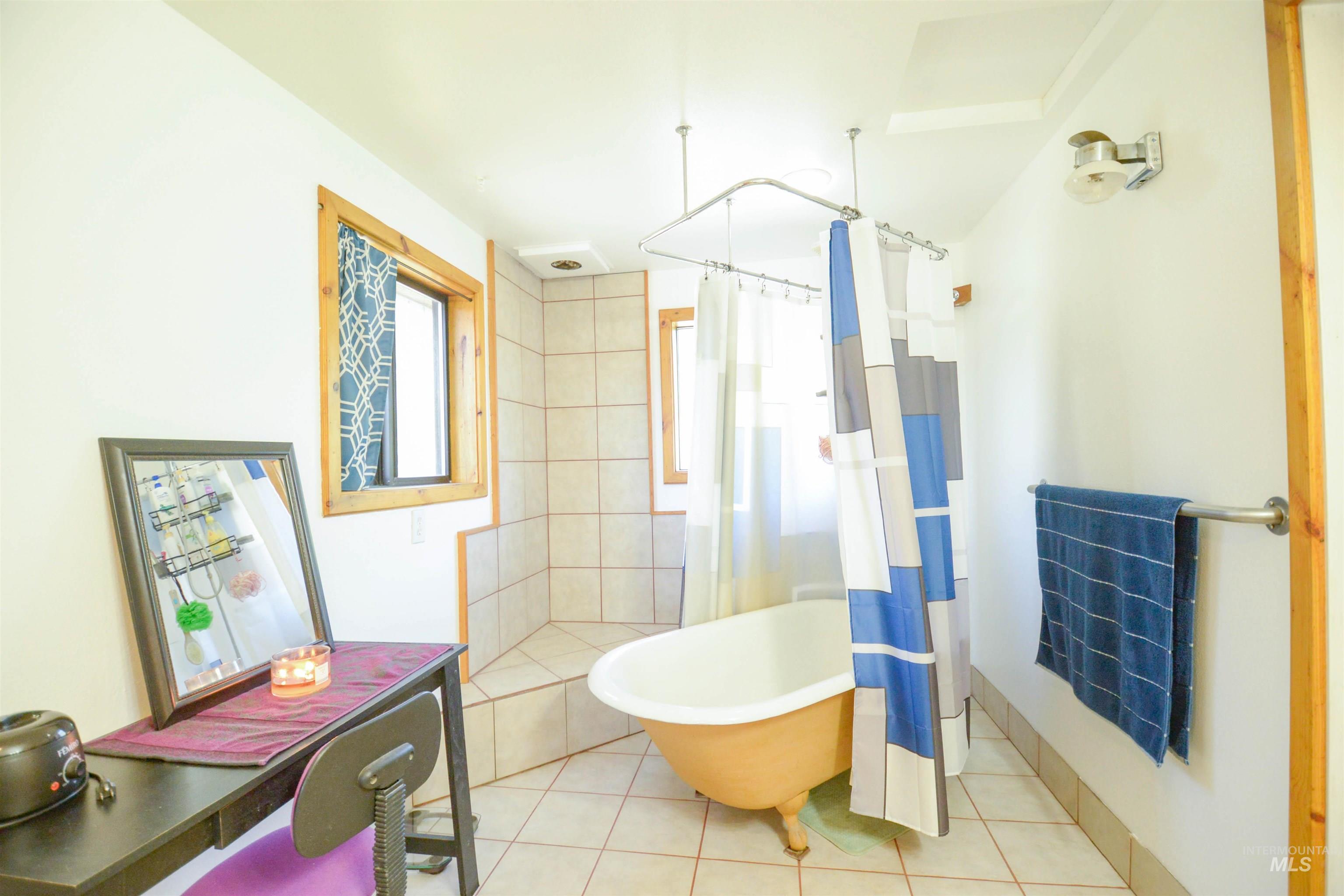 Bathroom featuring tile patterned flooring