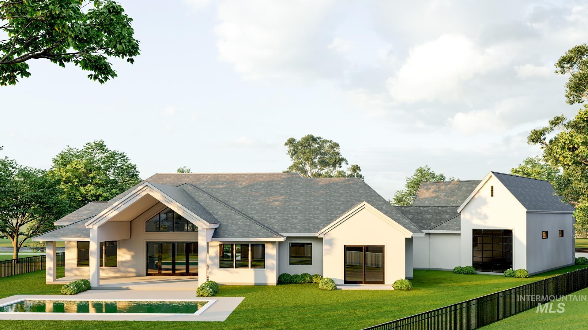 View of front of property with a fenced backyard, stucco siding, a patio area, and a shingled roof