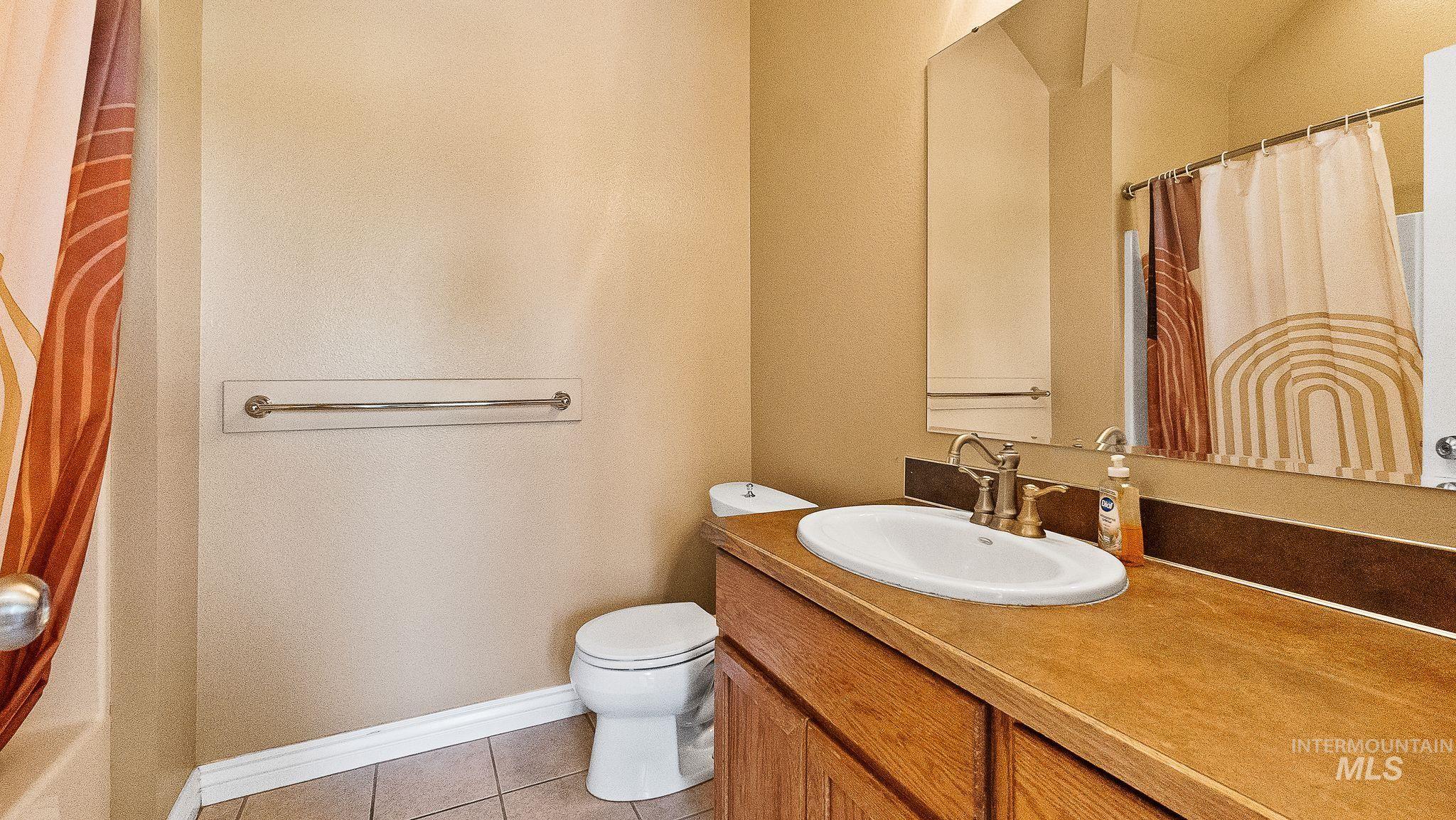 Upstairs Bathroom with vaulted ceilings
