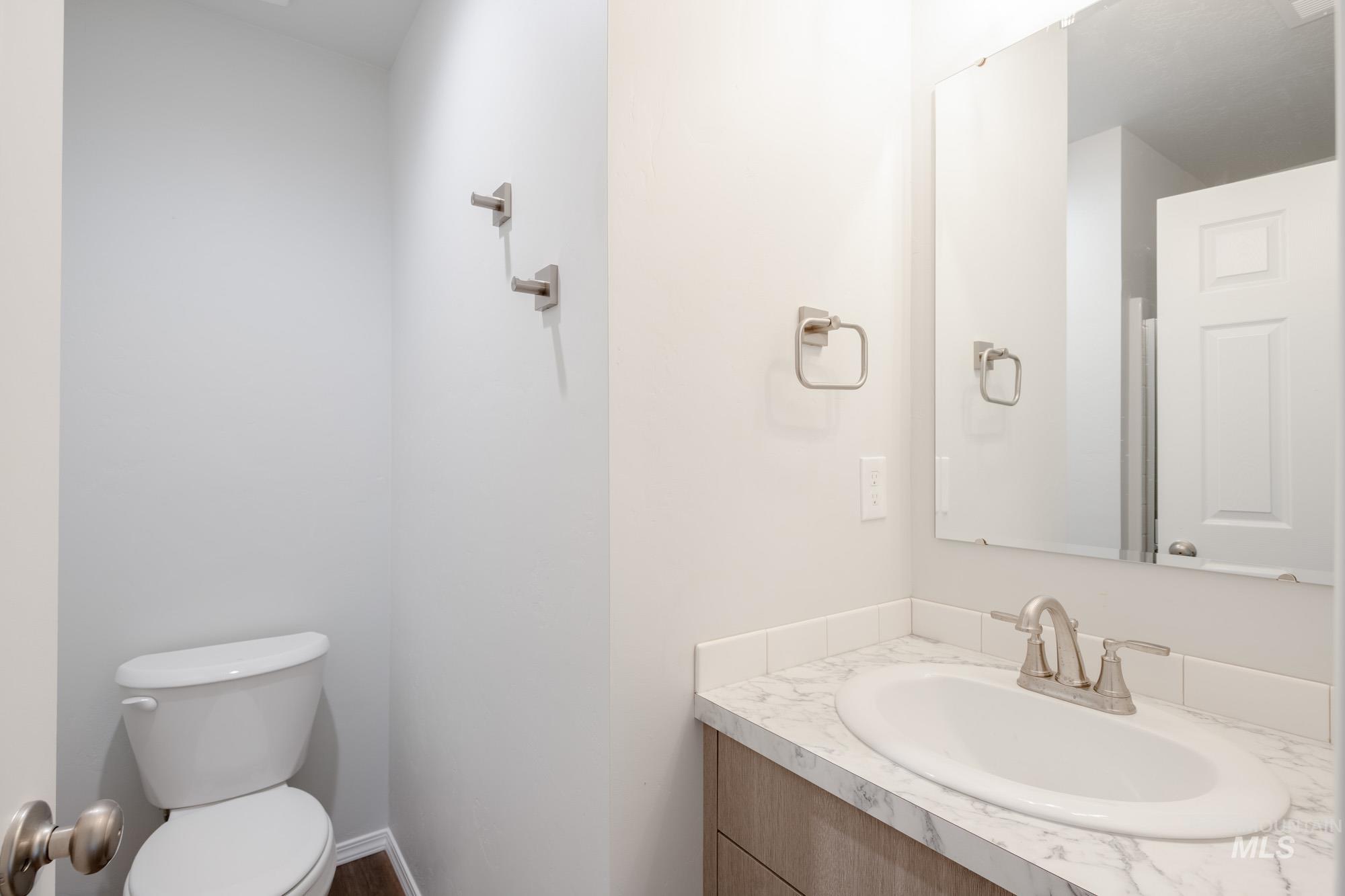 Bathroom with vanity and toilet