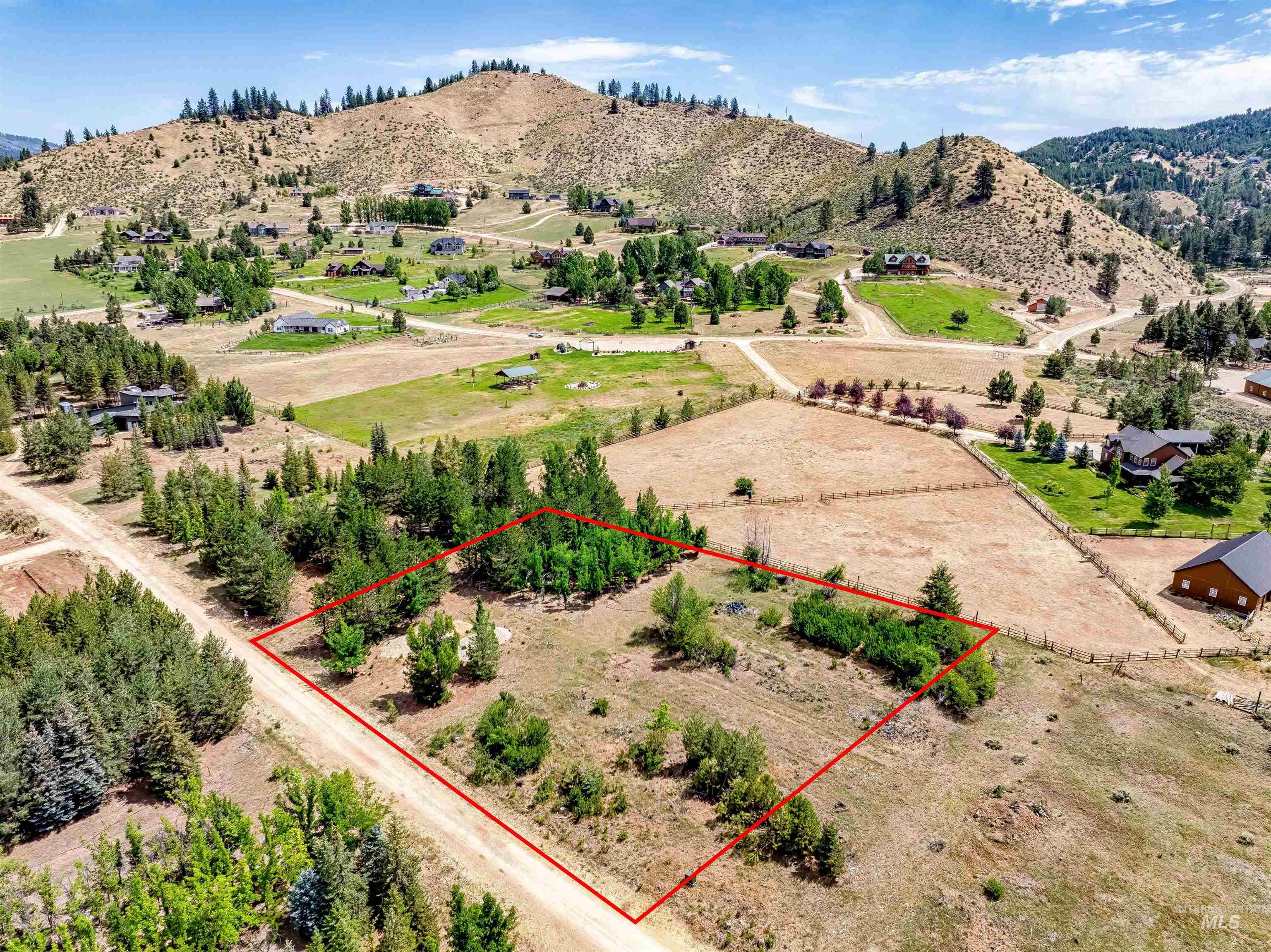 View of property location with property boundaries highlighted and mountains