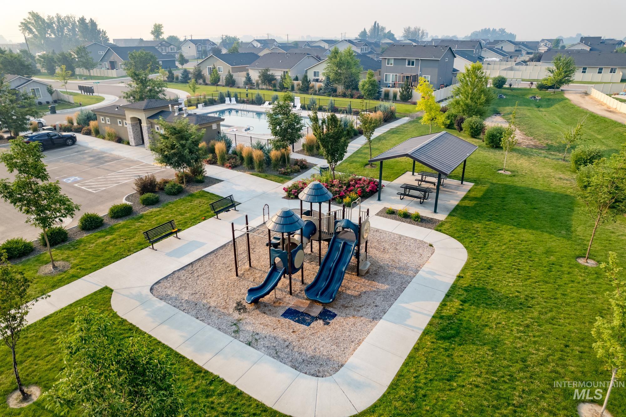 Aerial perspective of suburban area with a park