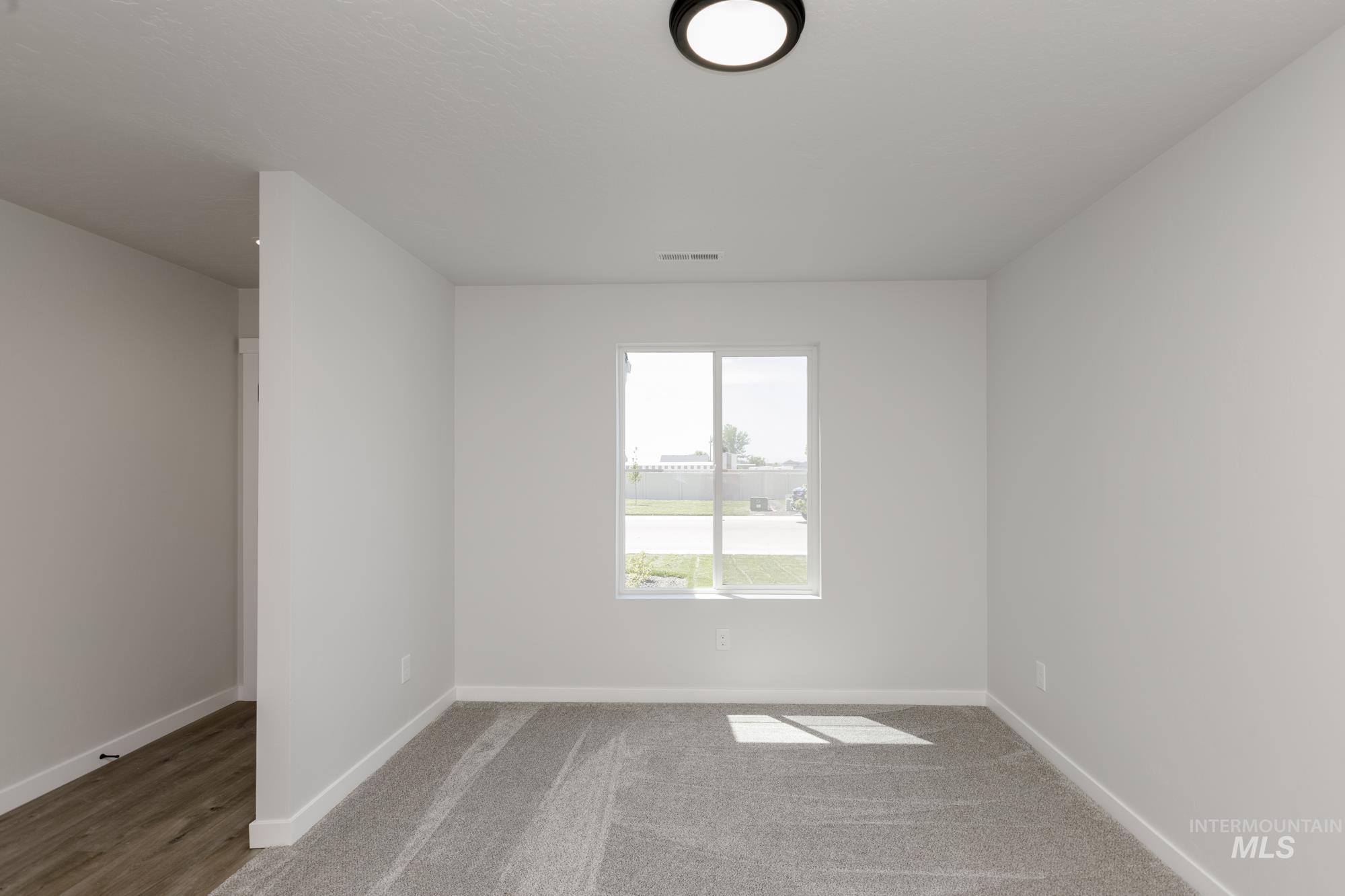 Spare room with baseboards