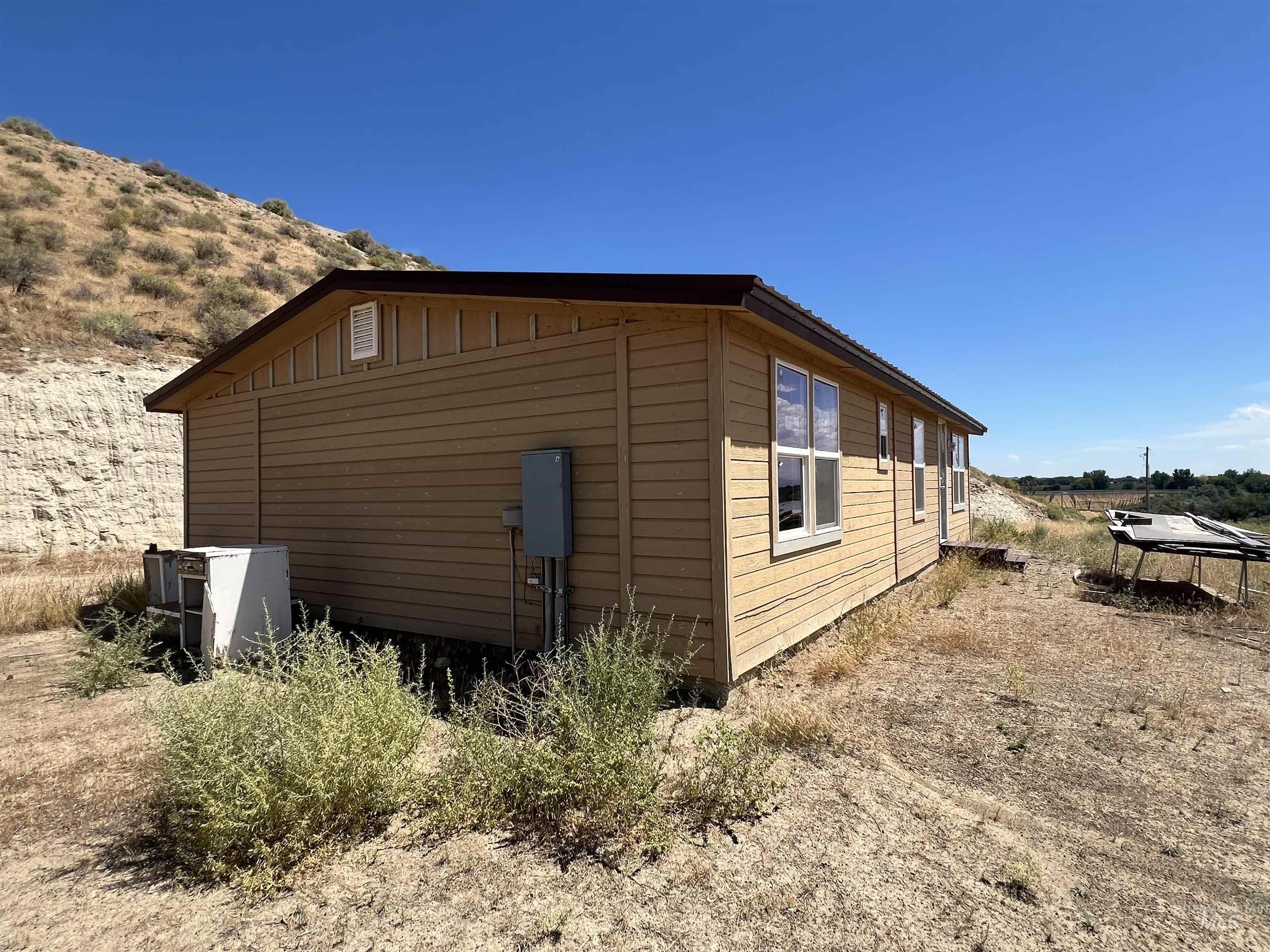 View of side of property with board and batten siding
