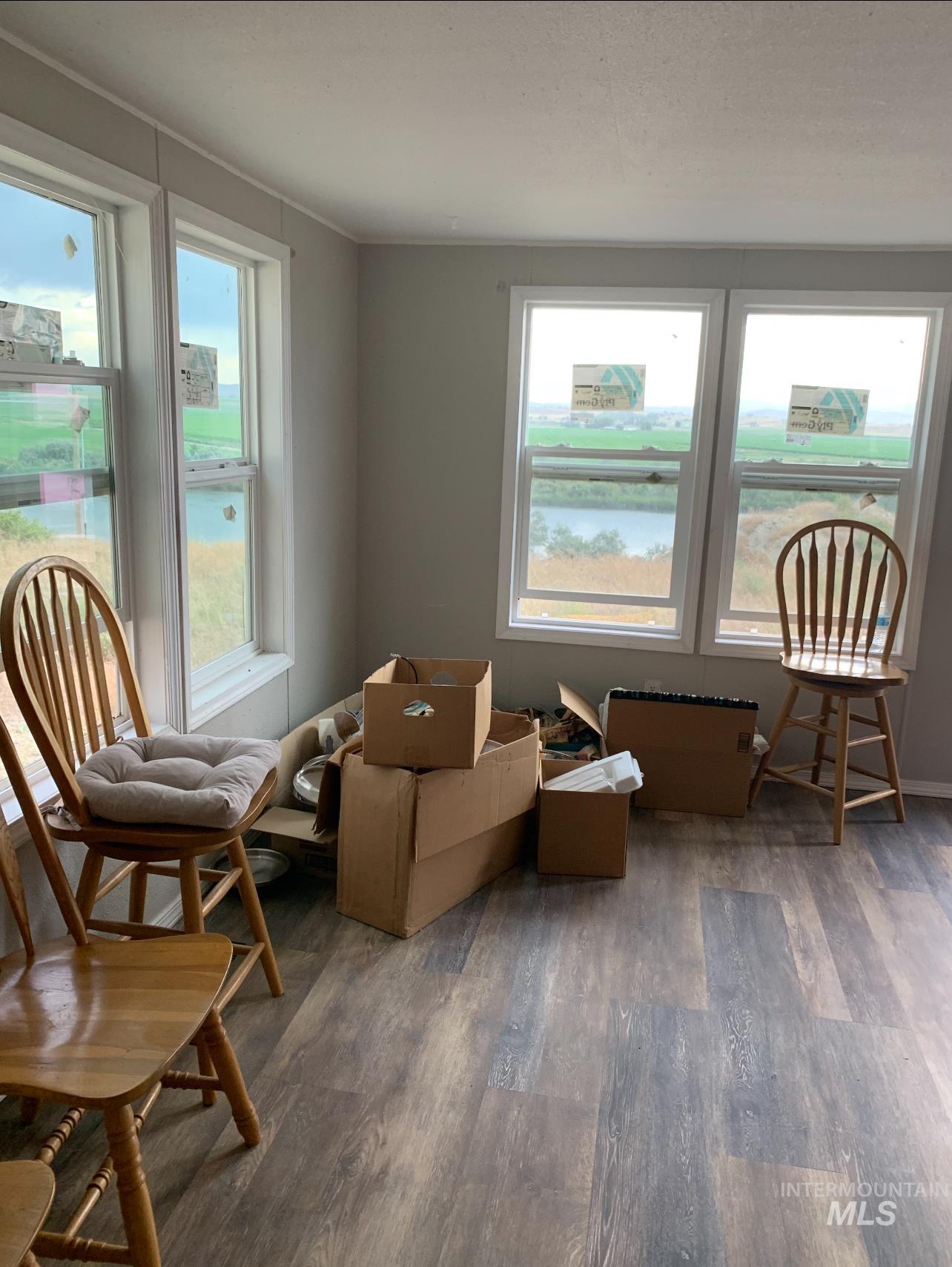 Sitting room featuring wood finished floors