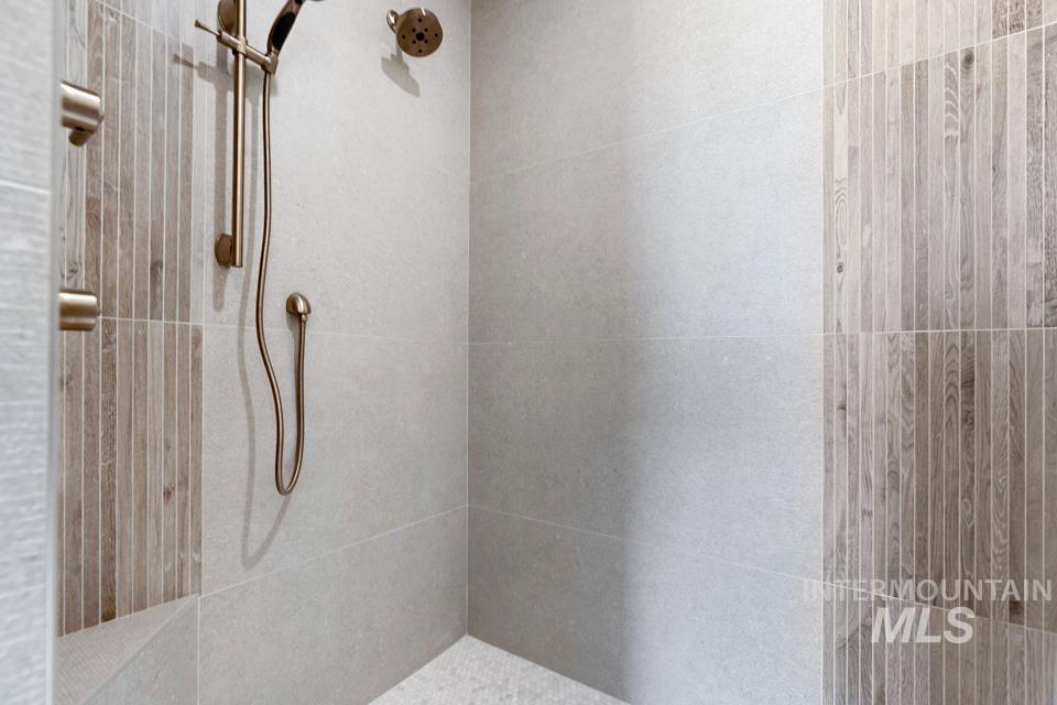 Bathroom with tiled shower