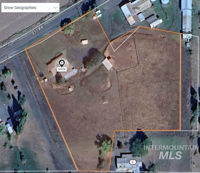 Aerial overview of property's location featuring property boundaries highlighted
