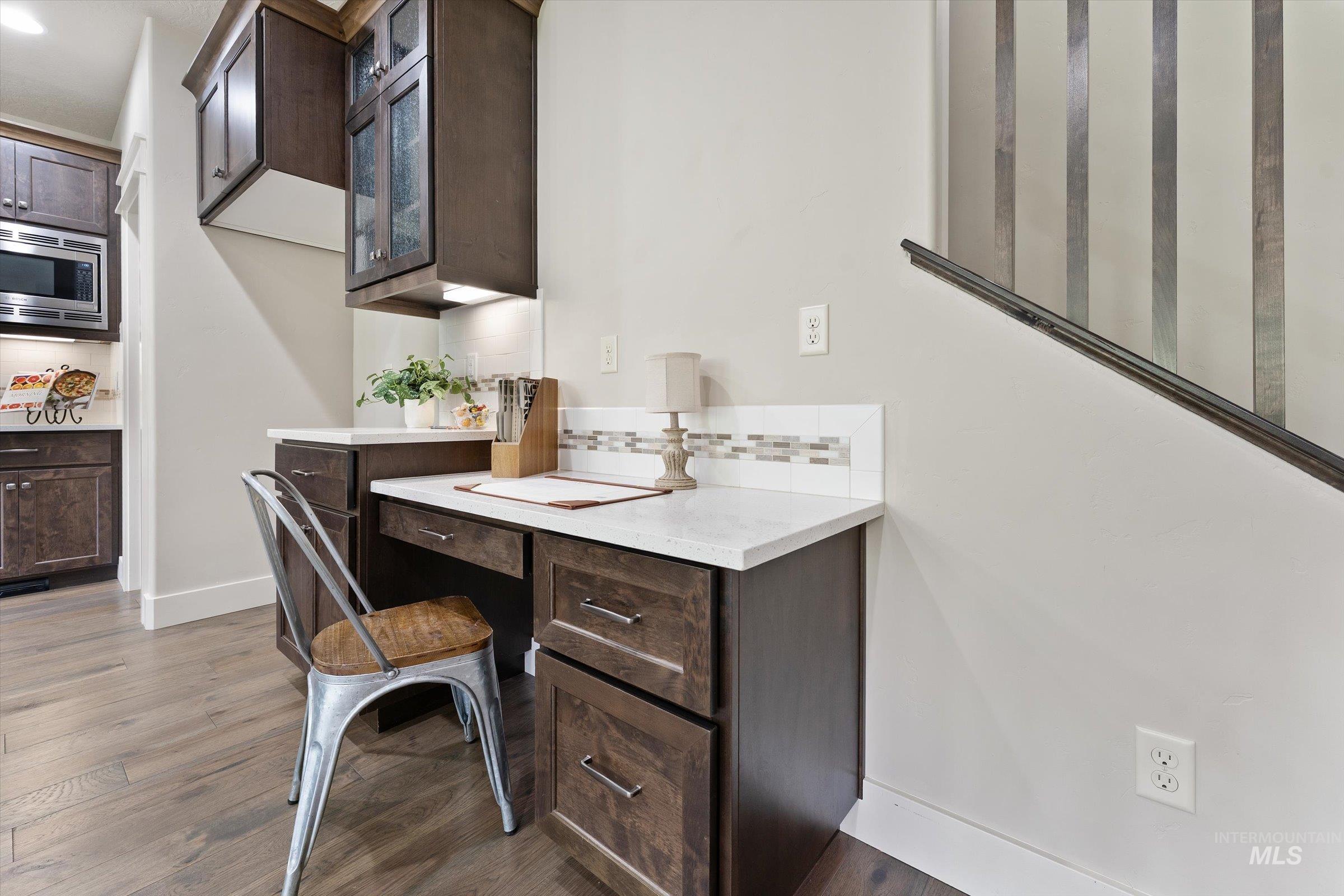 Home office featuring light wood-style flooring