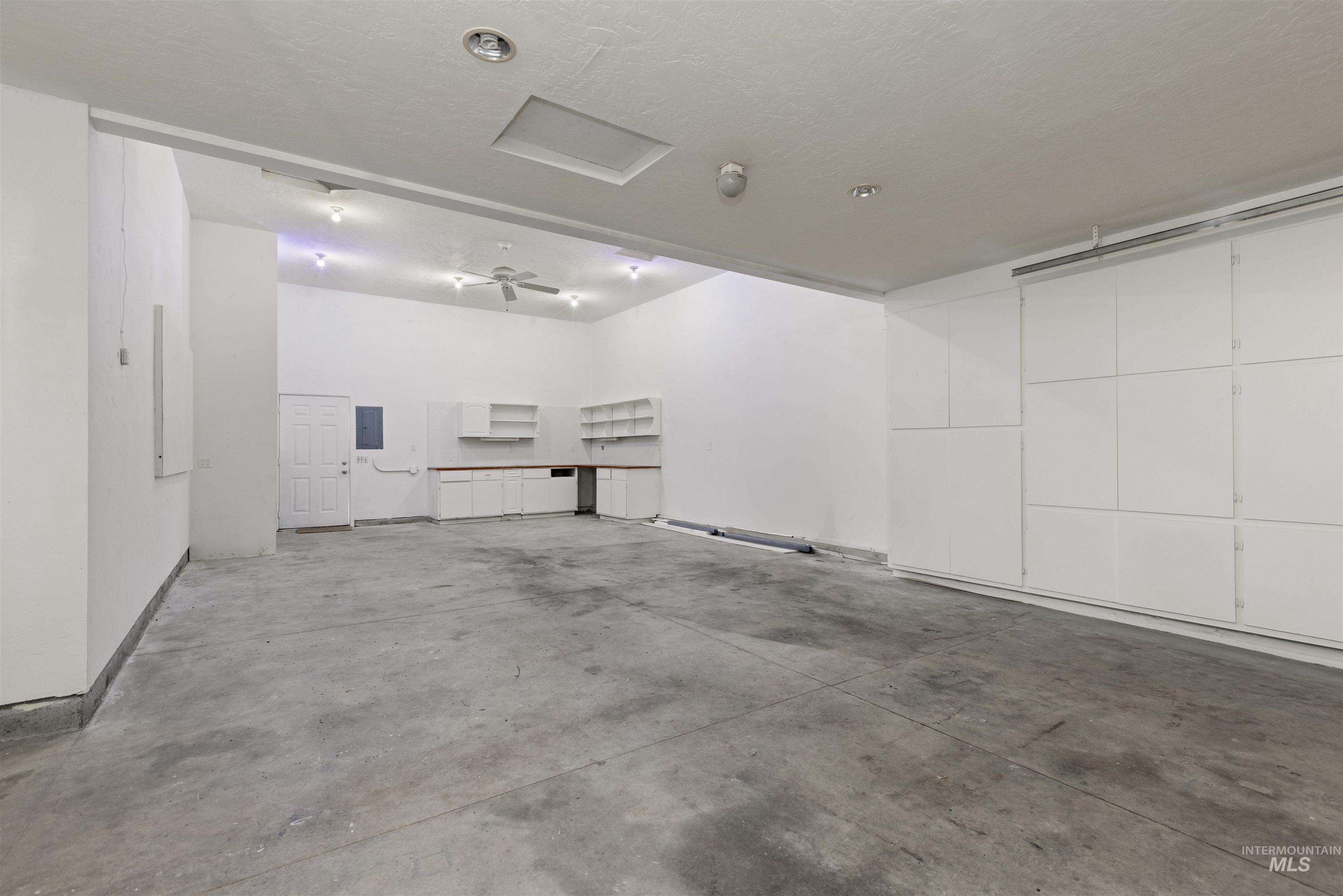 Garage featuring electric panel