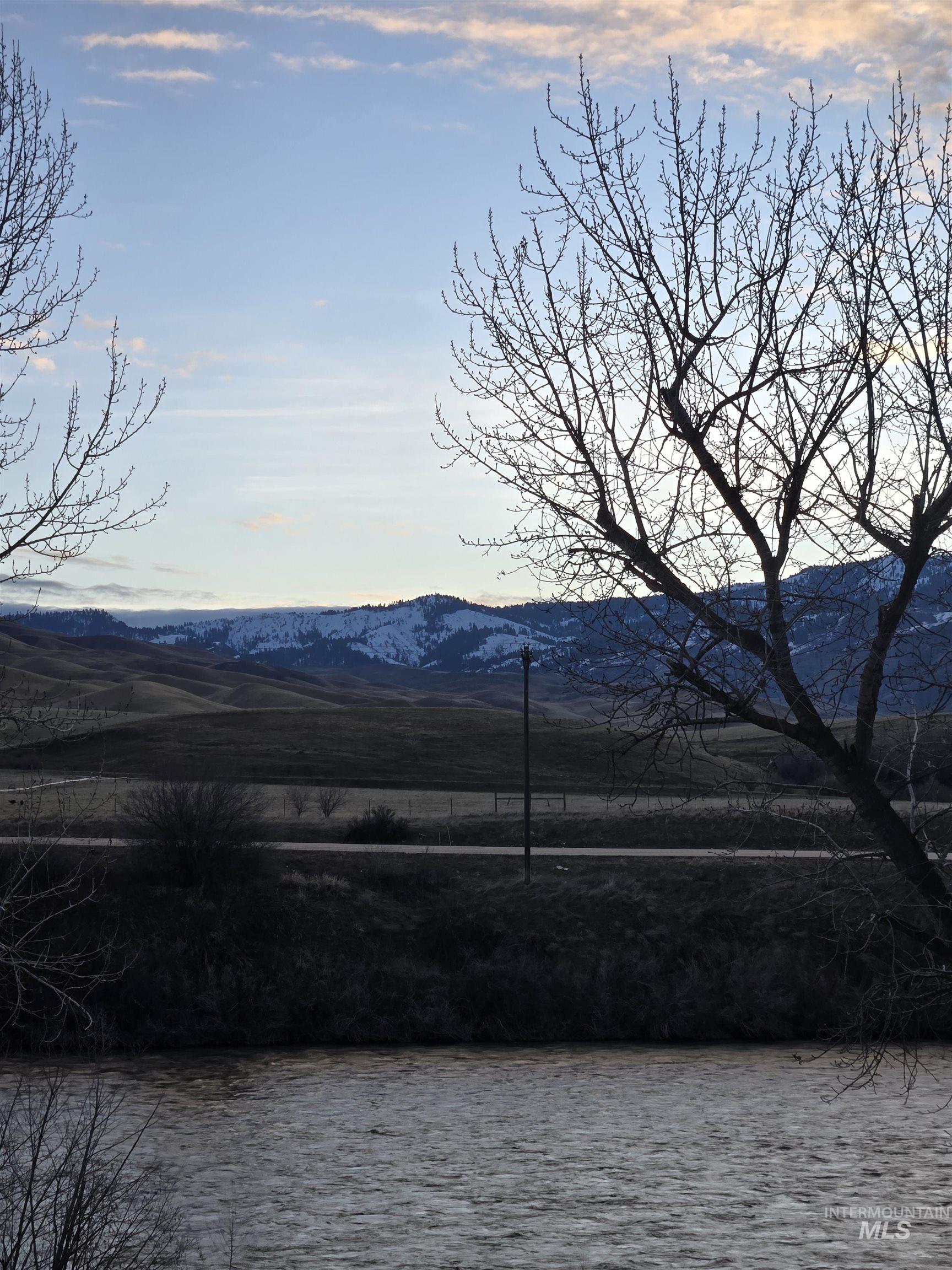 View of mountain background featuring a large body of water
