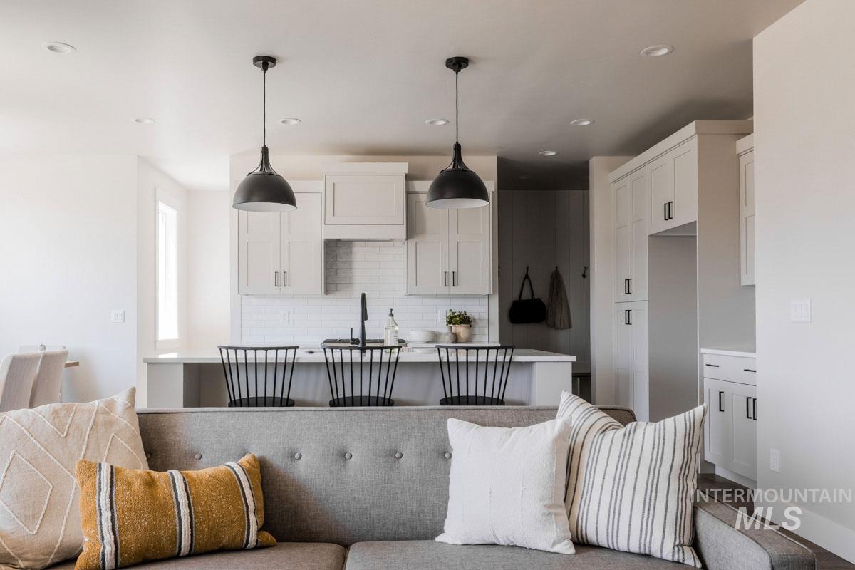 Living area featuring recessed lighting and wood finished floors