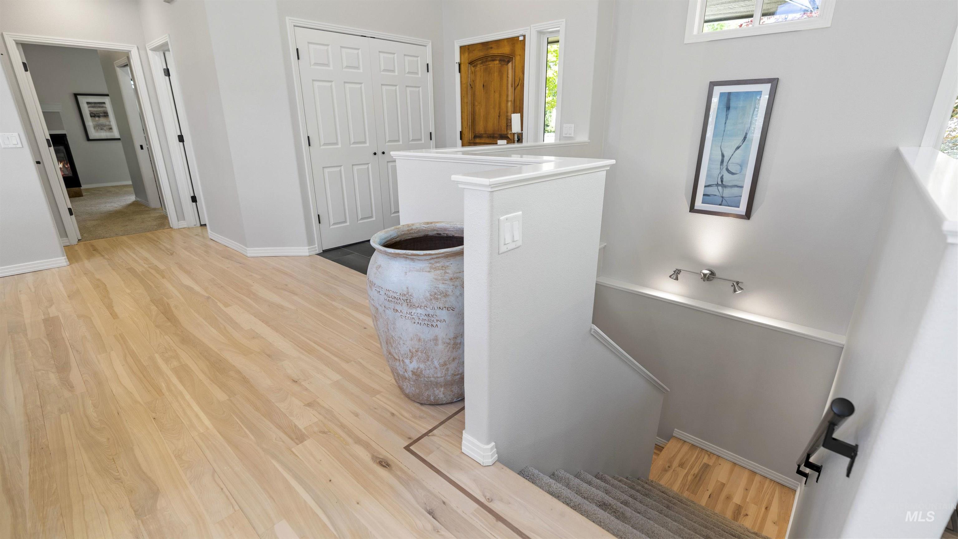 Interior space featuring light wood-type flooring and baseboards