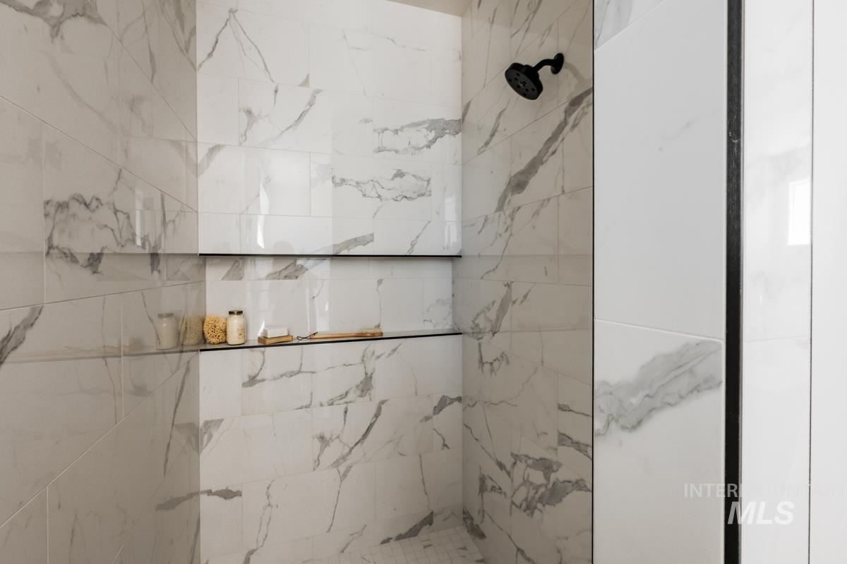 Bathroom with tiled shower