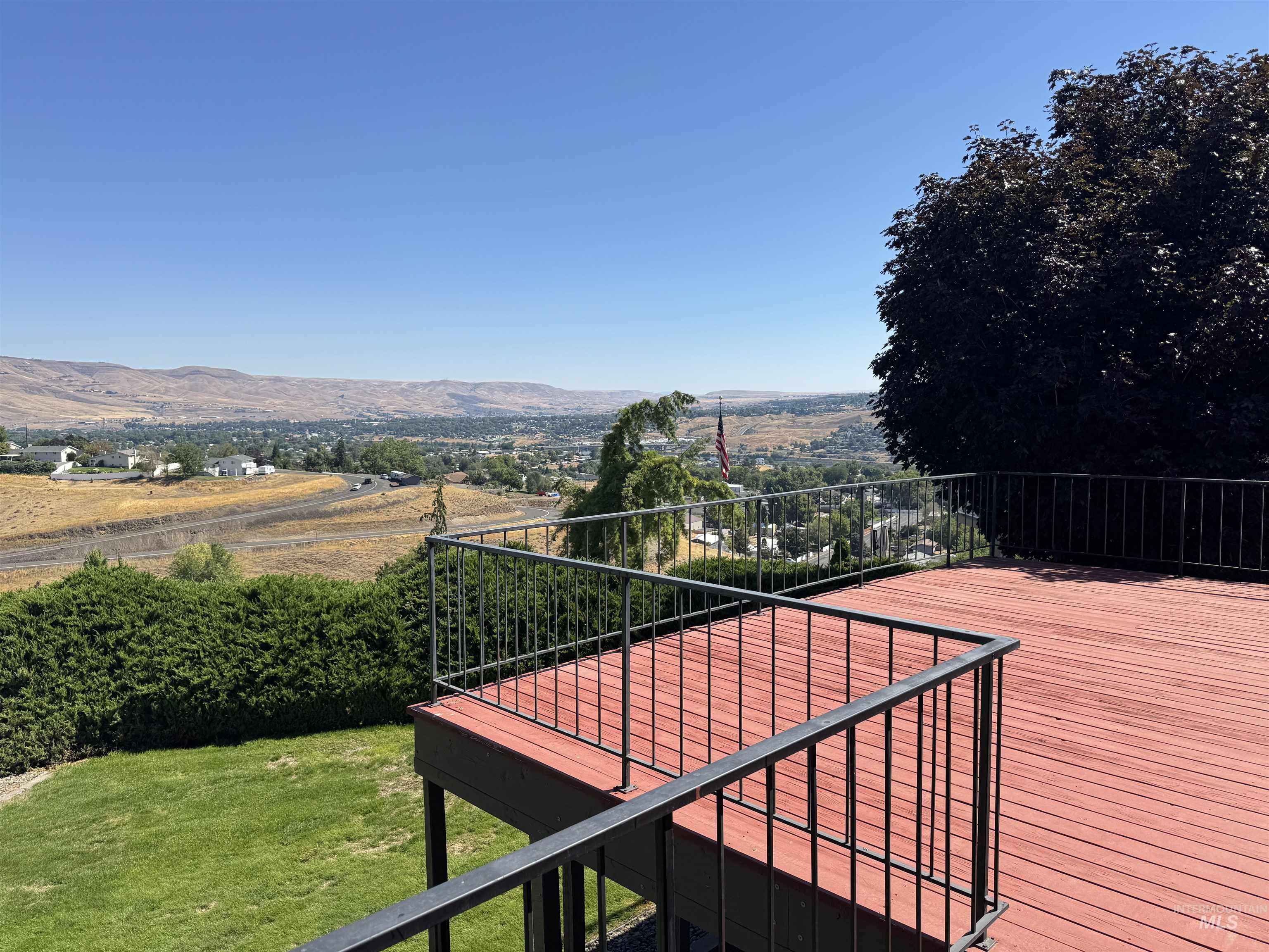 Wooden deck featuring a mountain view