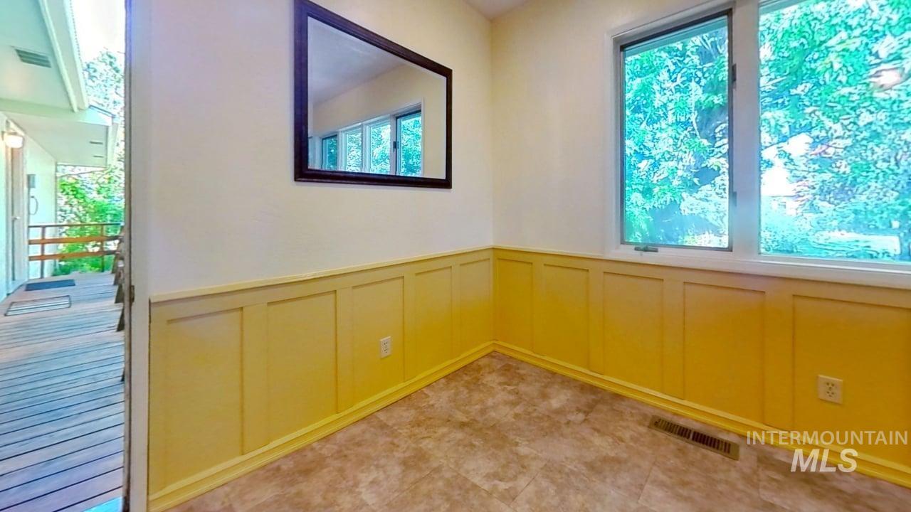 Detailed view of a decorative wall and a wainscoted wall