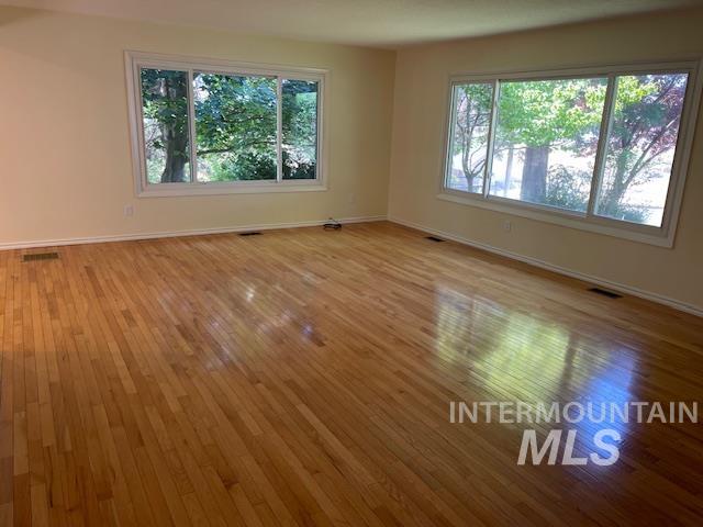 Beautiful hardwood floors, freshly painted living room