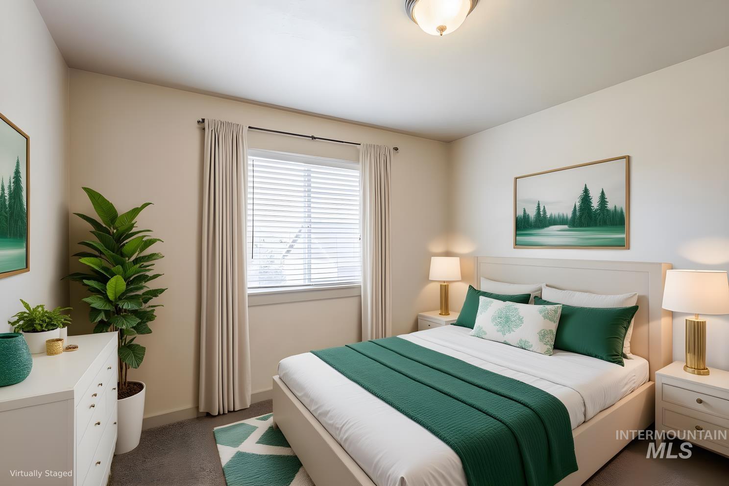Bedroom featuring carpet and baseboards
