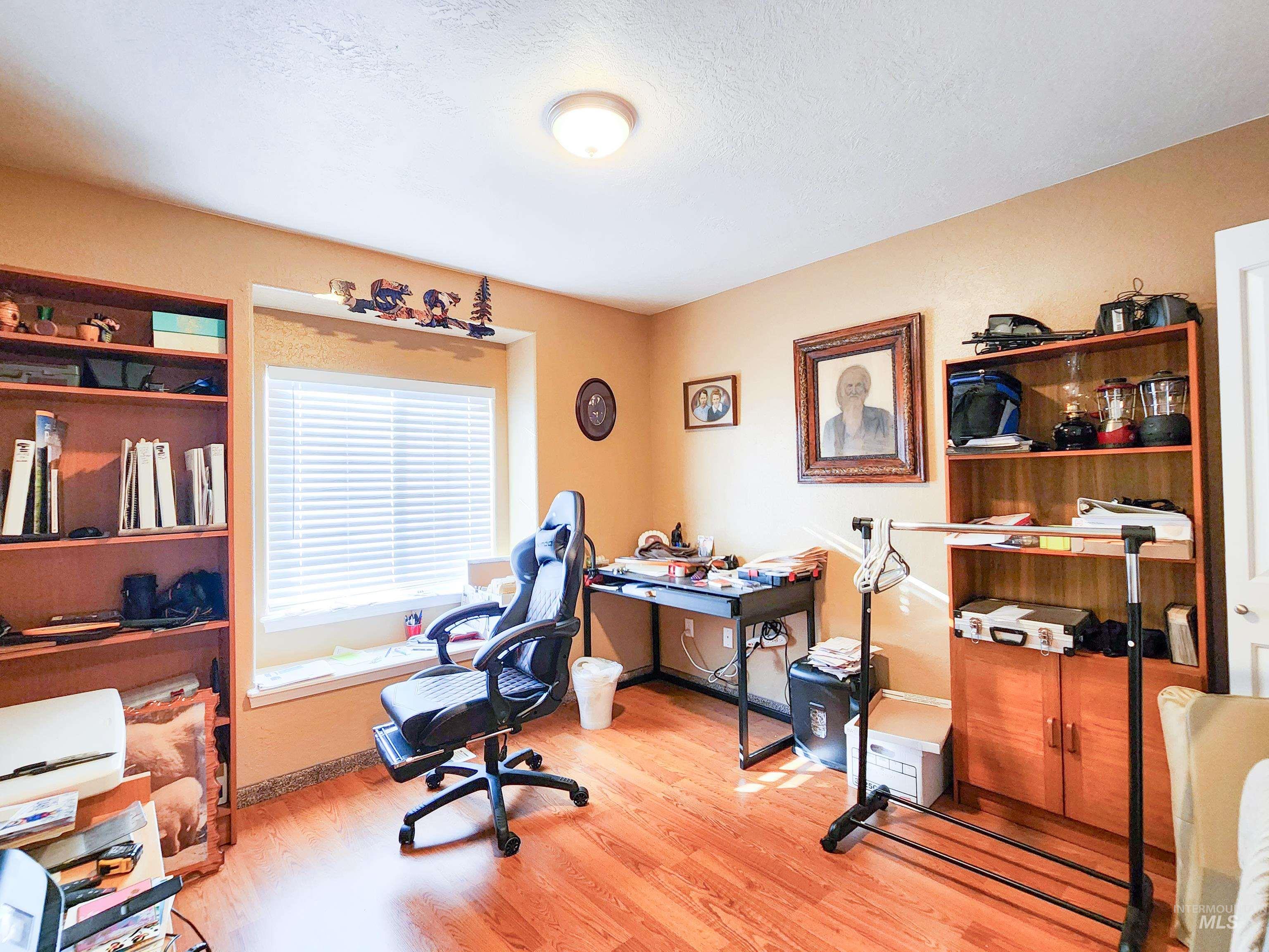 Office featuring wood finished floors