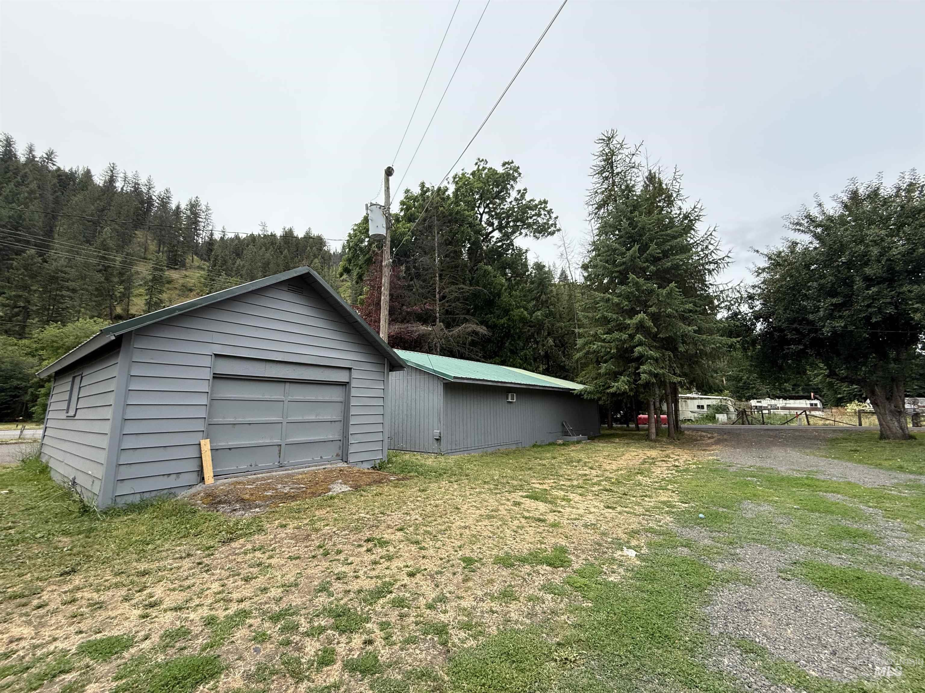 Detached garage featuring driveway