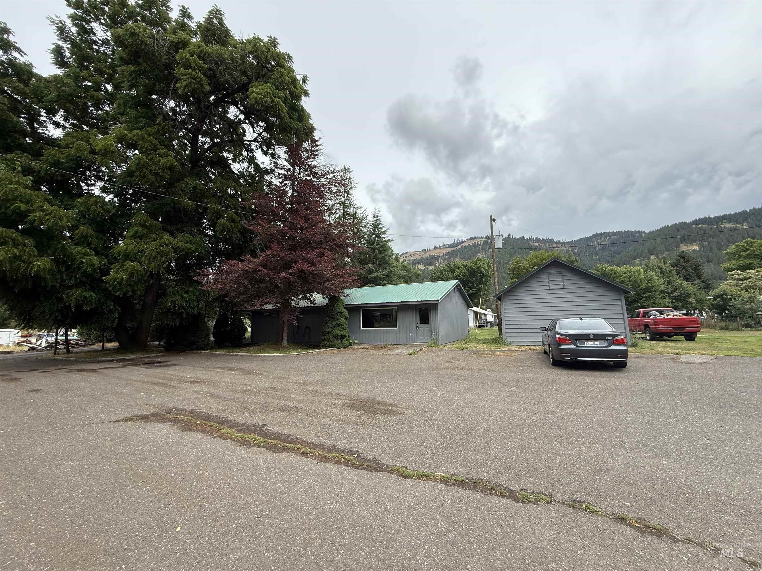 View of front of property with a detached garage