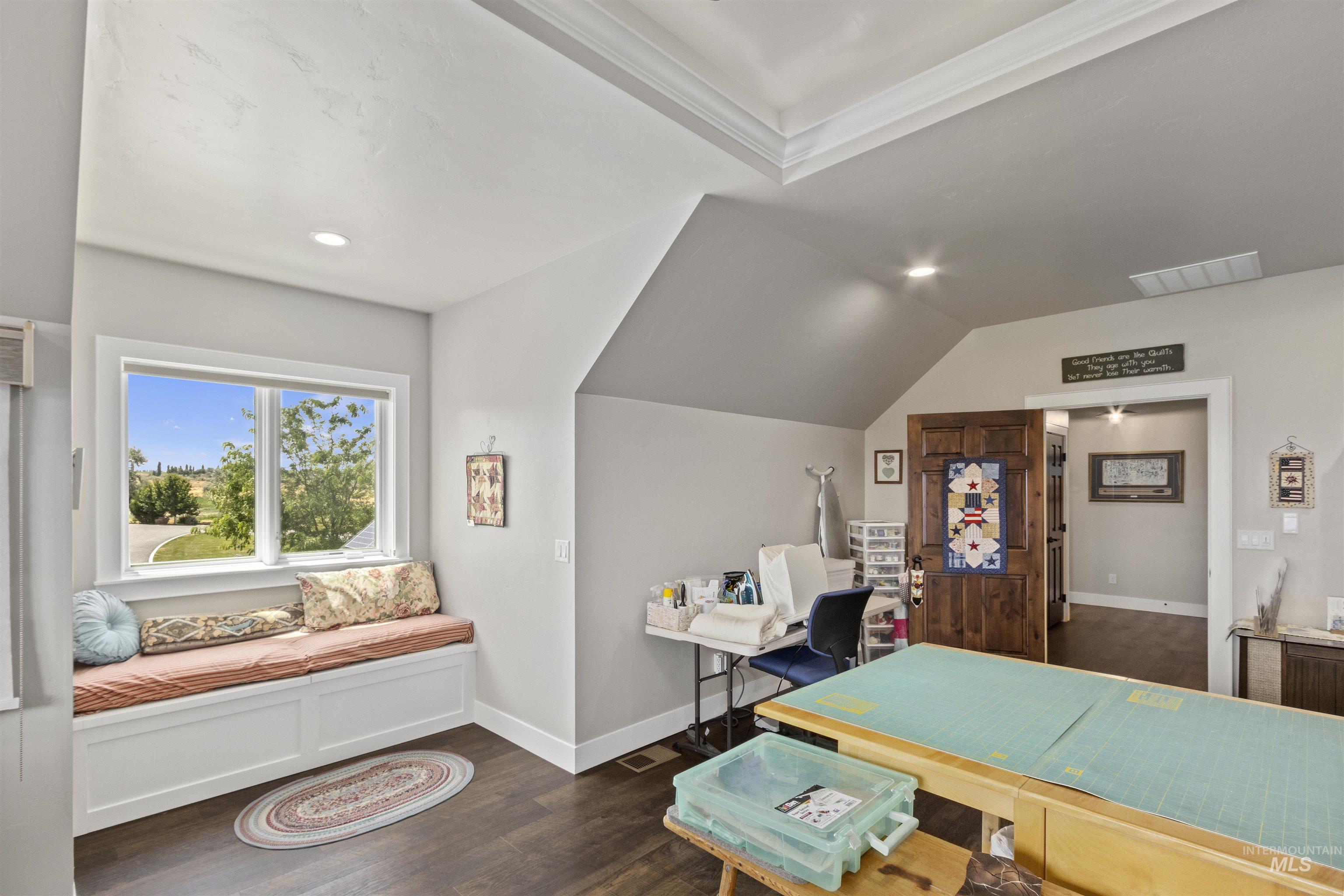 Office featuring dark wood-style floors, crown molding, recessed lighting, and vaulted ceiling