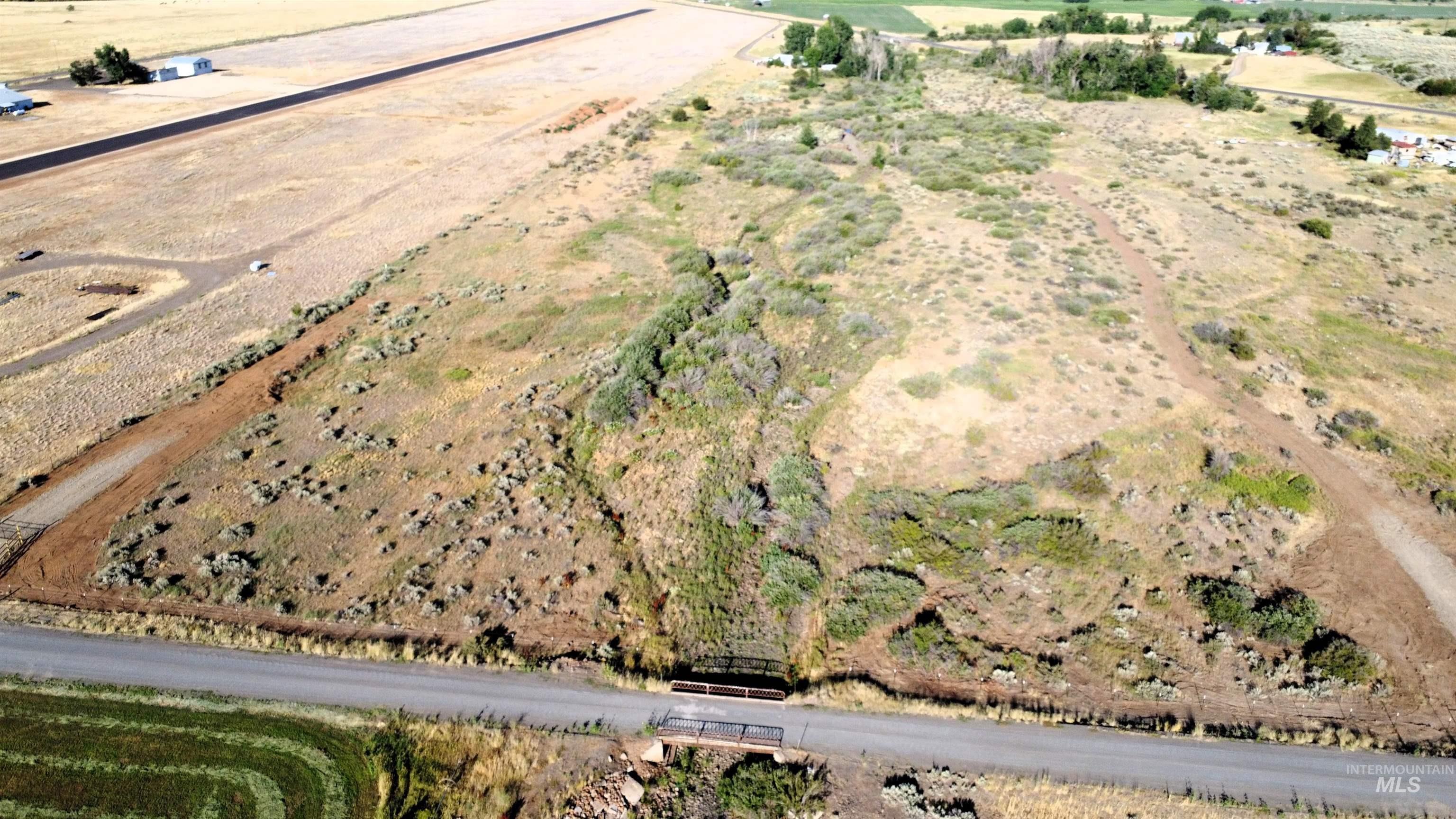 Aerial view of property's location with rural landscape