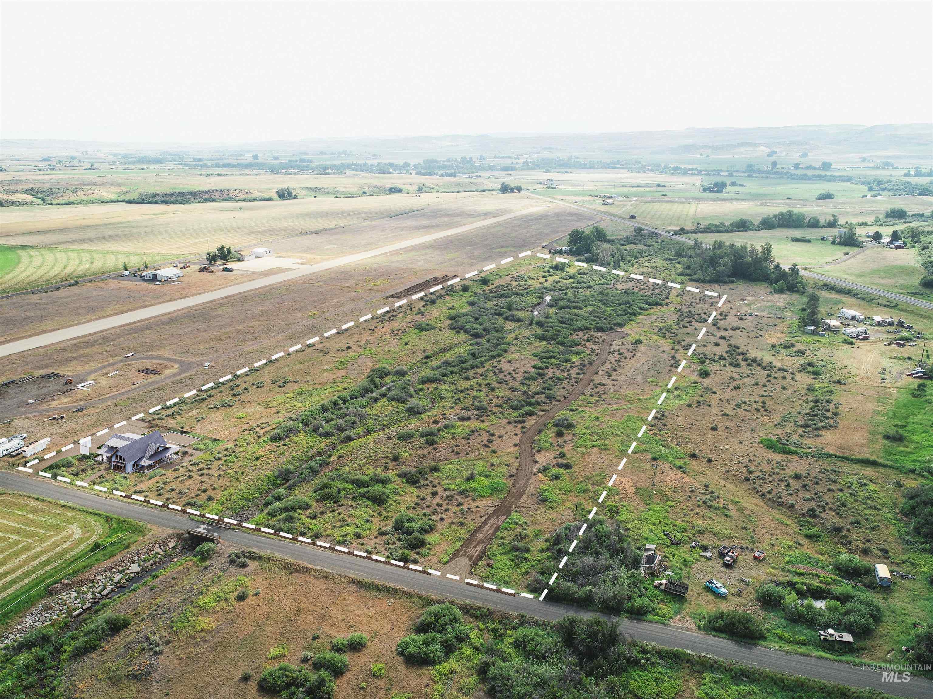 Aerial view of property's location with rural landscape