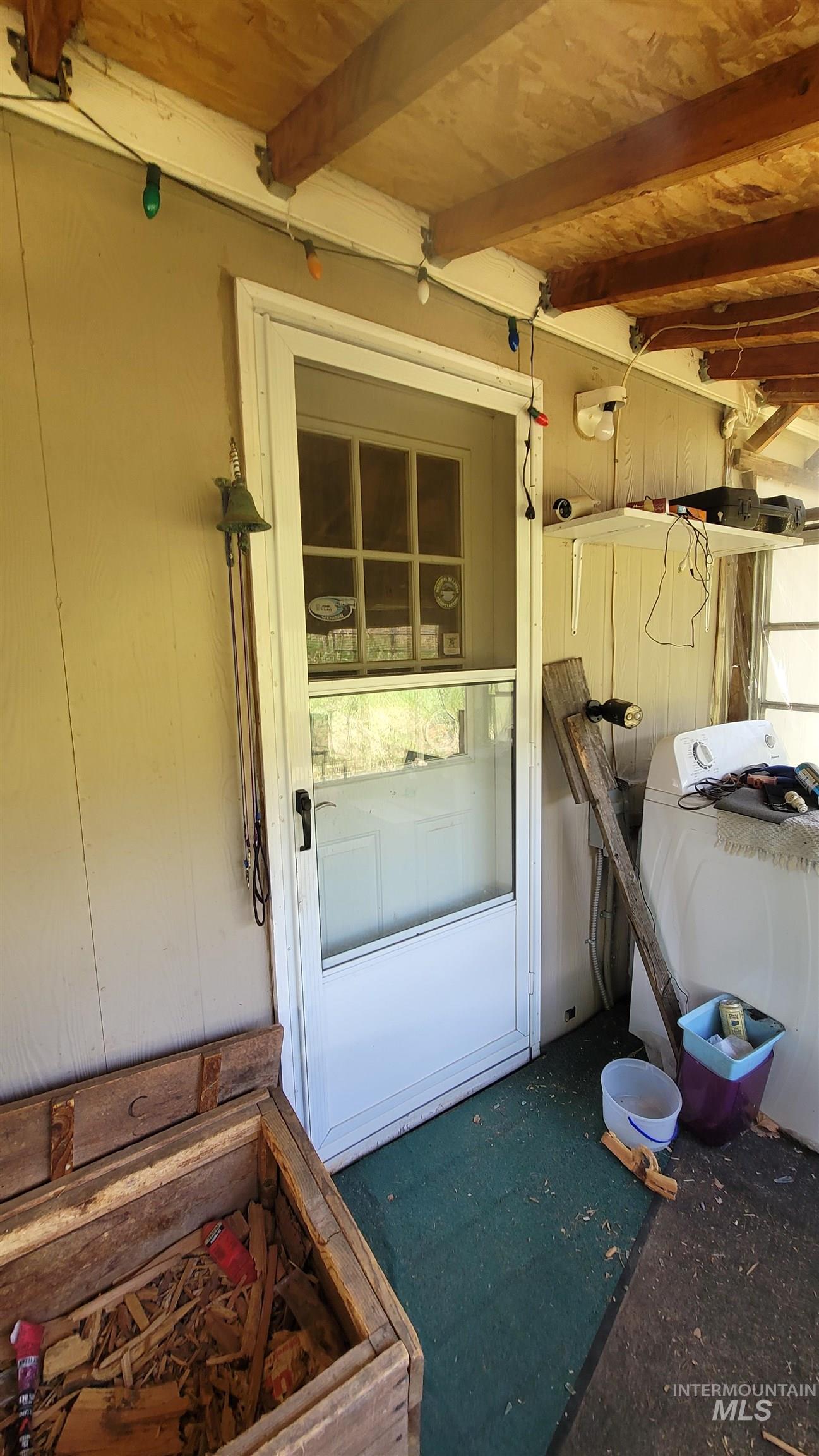 Property entrance with washer / clothes dryer