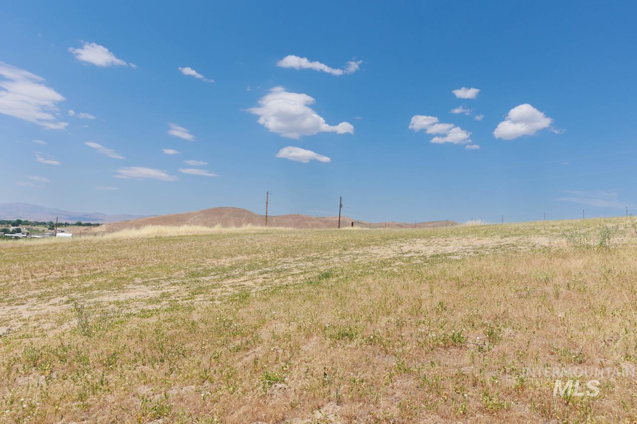 View of mountain background featuring rural landscape