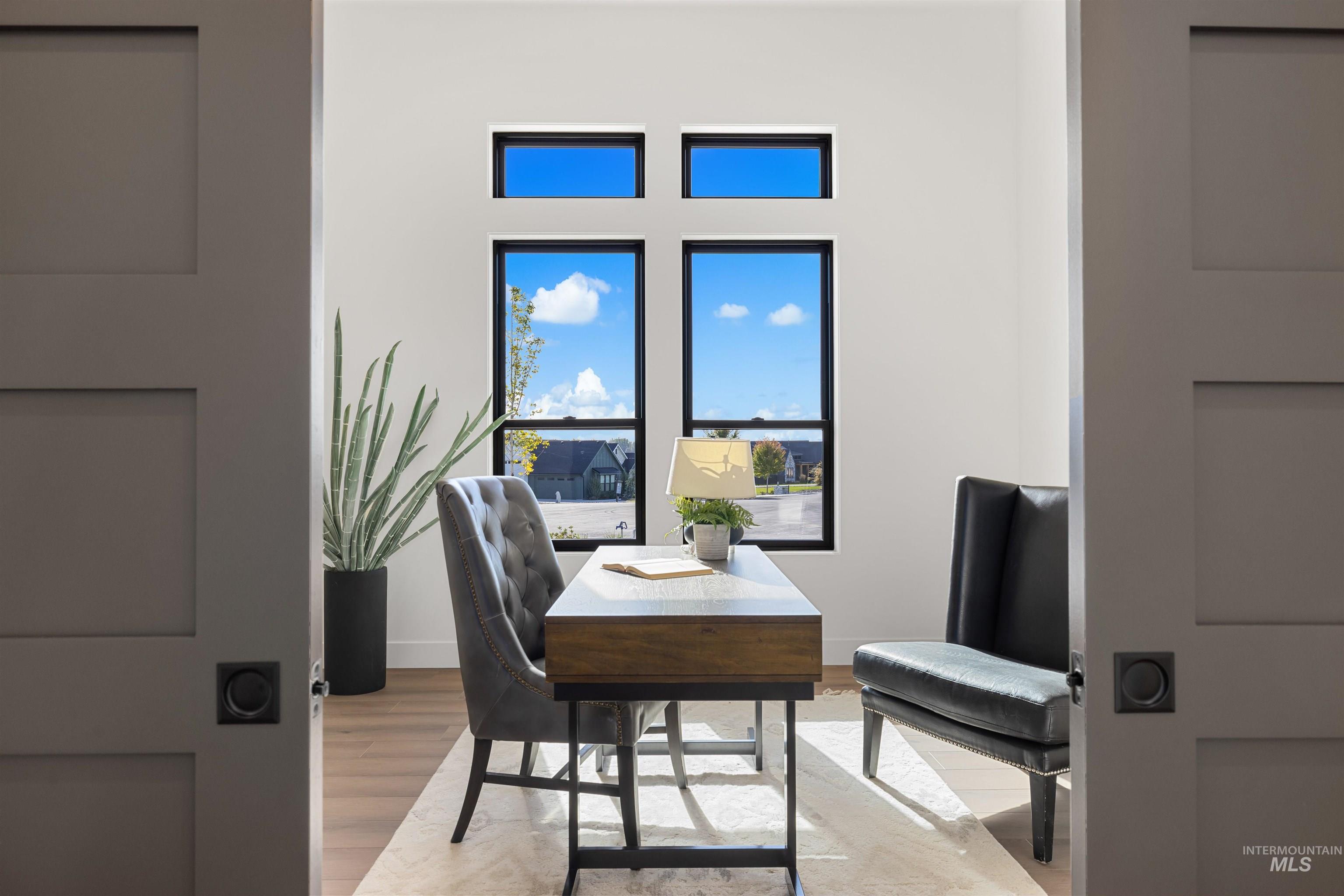 Office featuring light wood-type flooring and baseboards