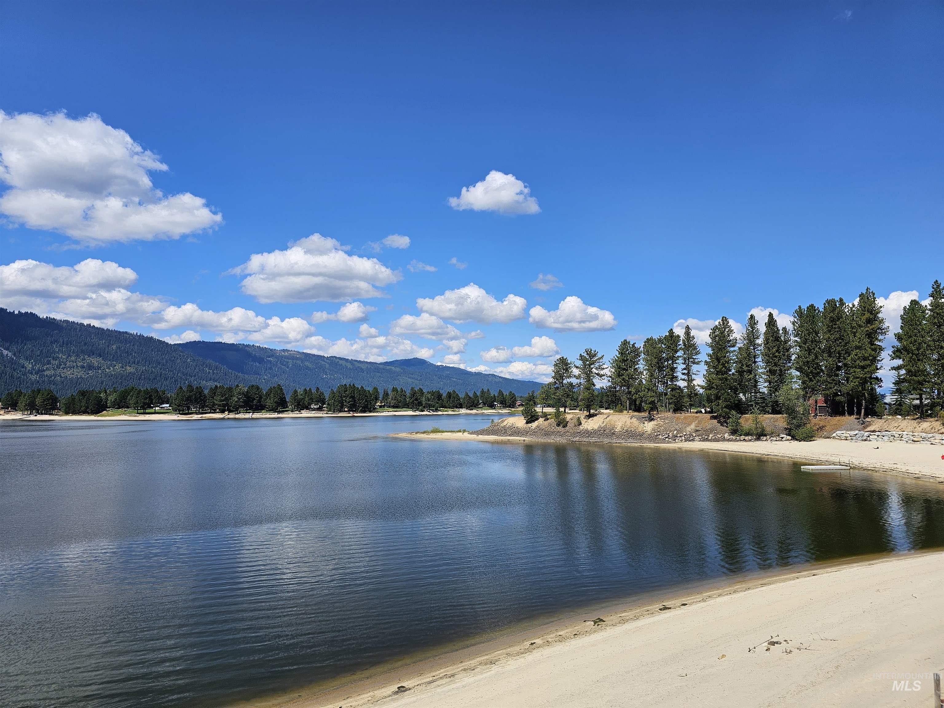 Public (Bureau of Reclamation) land with lake and beach access just a couple of lots to the south. Or walk through the public land behind the house and hit the other part of the lake.