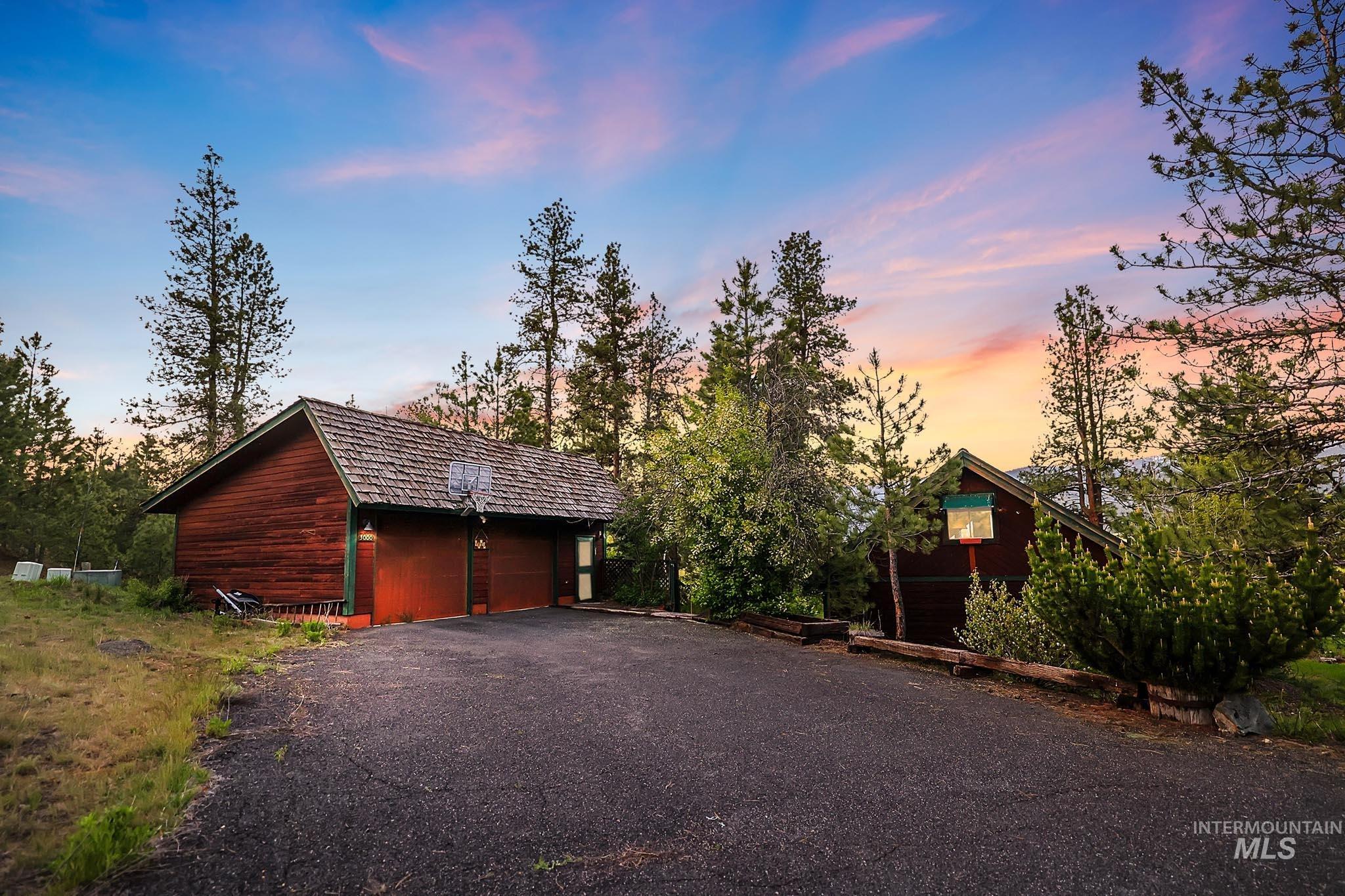 Detached garage with workshop and full bathroom.