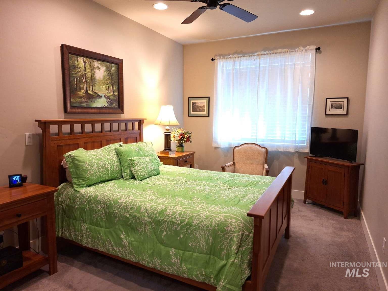 Bedroom with carpet, recessed lighting, and ceiling fan