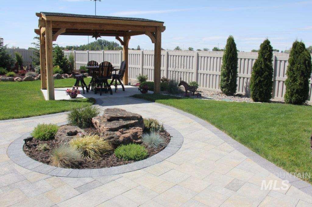 View of yard with a patio area and a gazebo