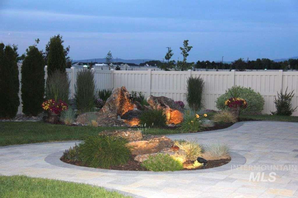 View of fenced backyard