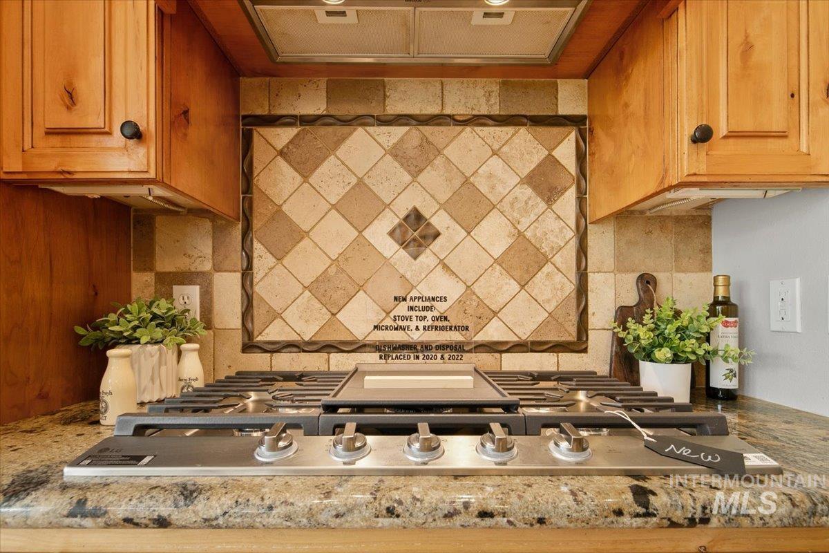 New stainless steel gas stovetop.