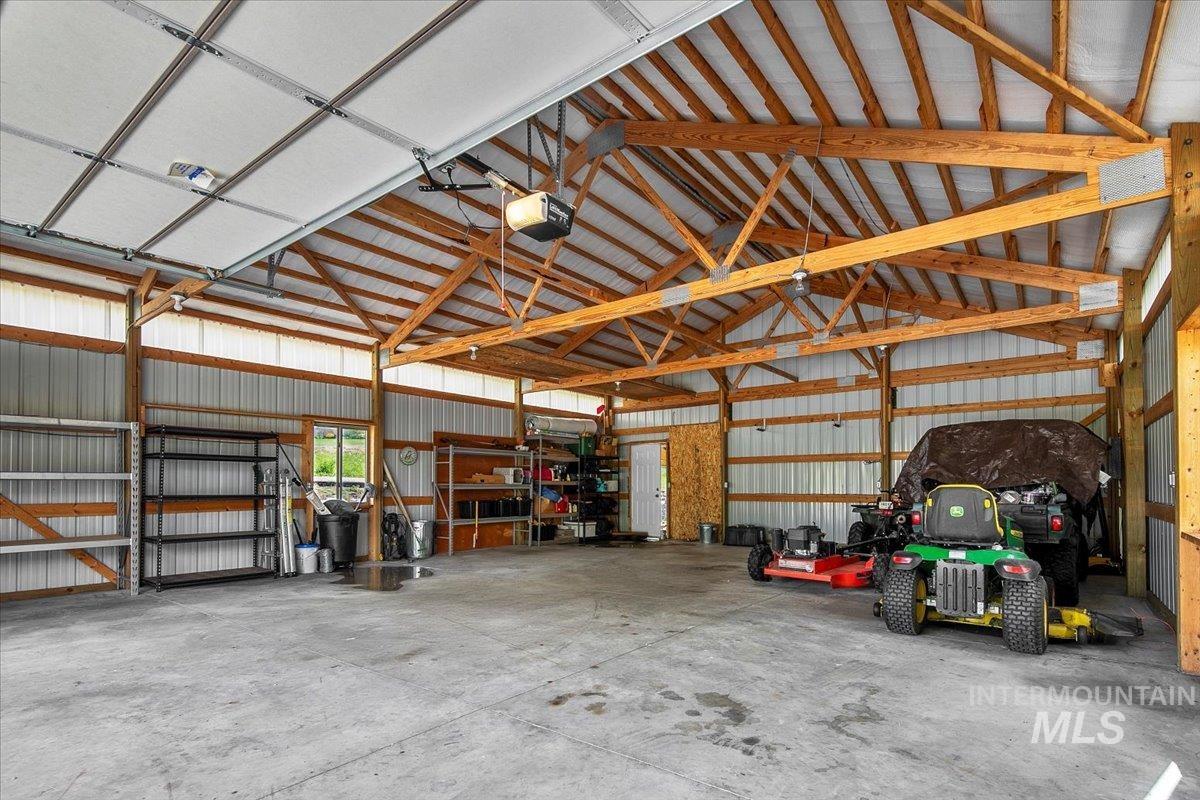 Garage with metal wall and a garage door opener