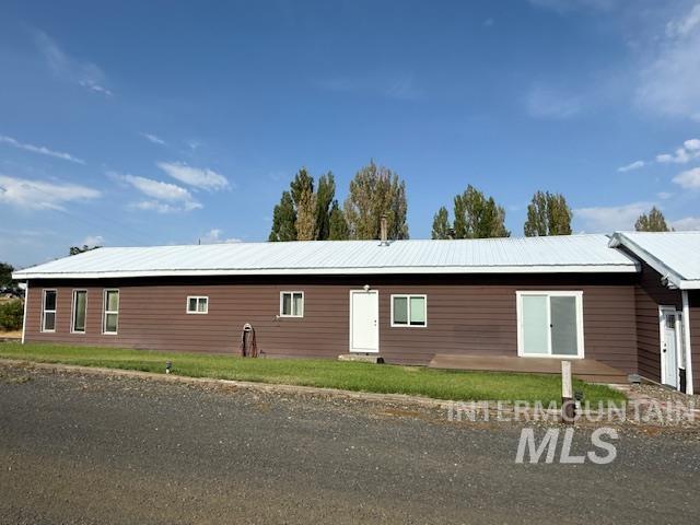 View of front facade with a metal roof