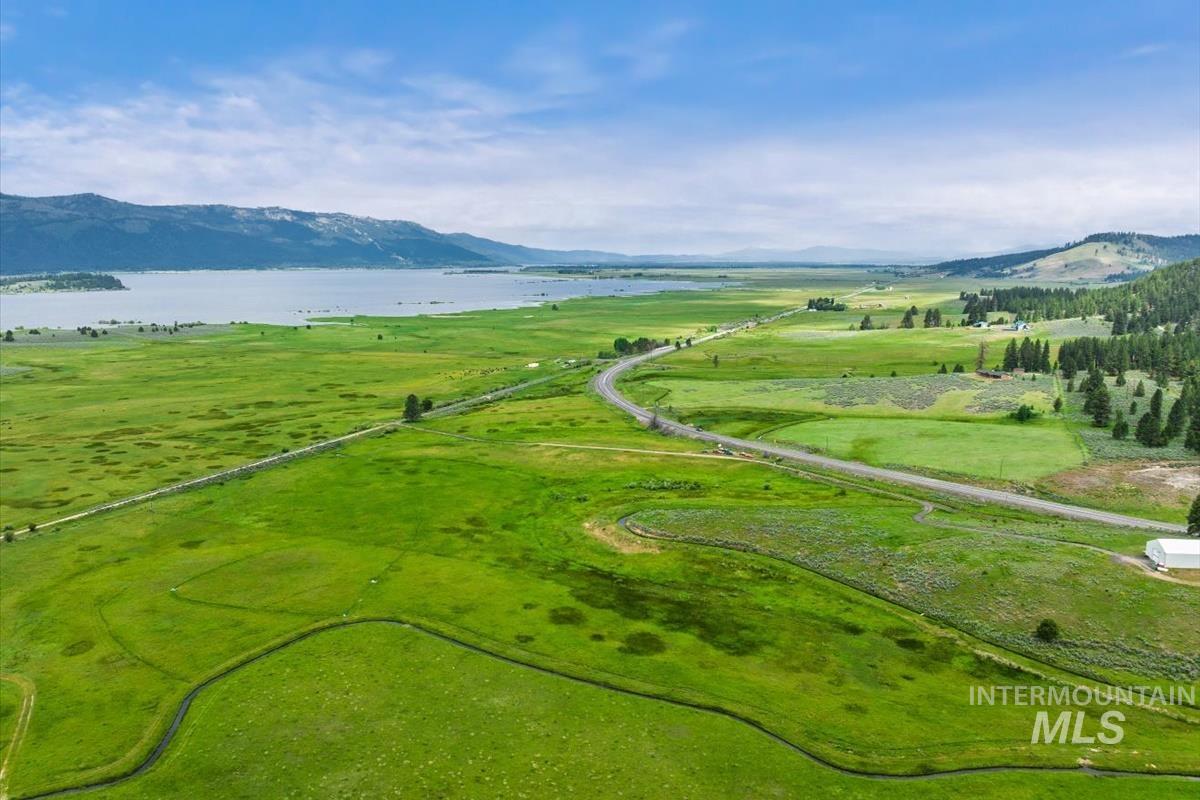 Overview of rural landscape with a water and mountain view