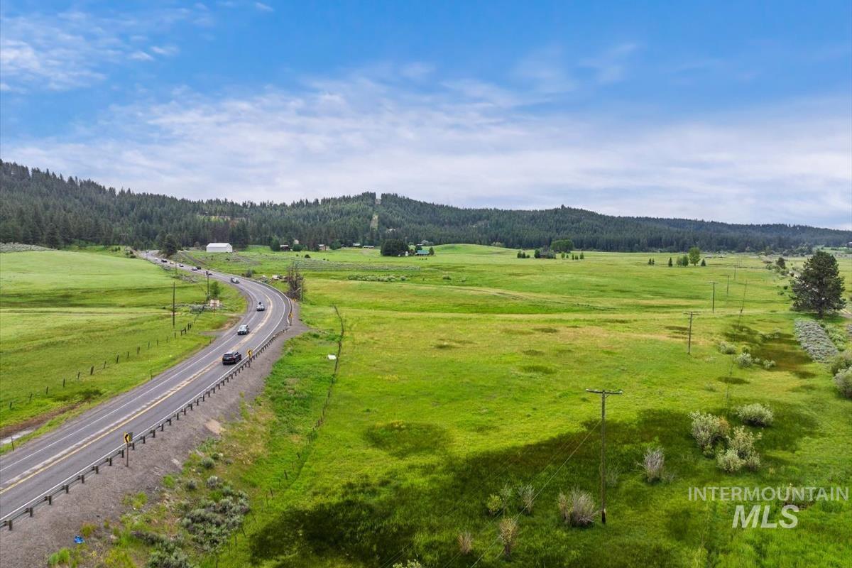 View of mountain background with a forest and rural landscape