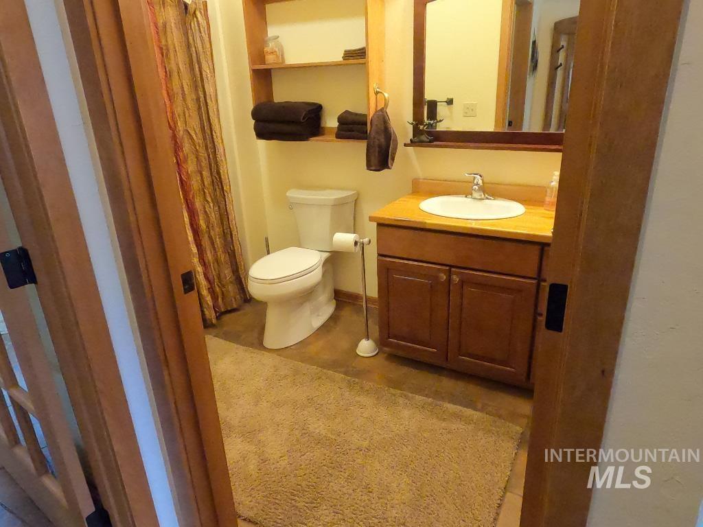 Bathroom featuring toilet and vanity