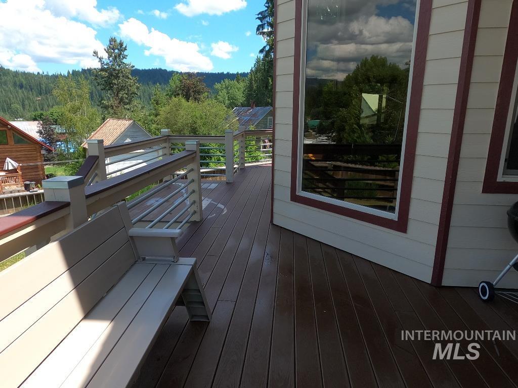 Deck featuring a forest view