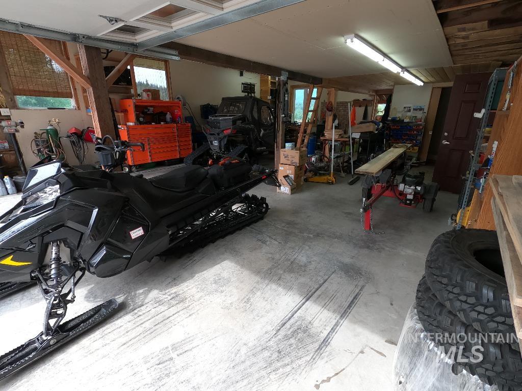 Garage featuring a workshop area